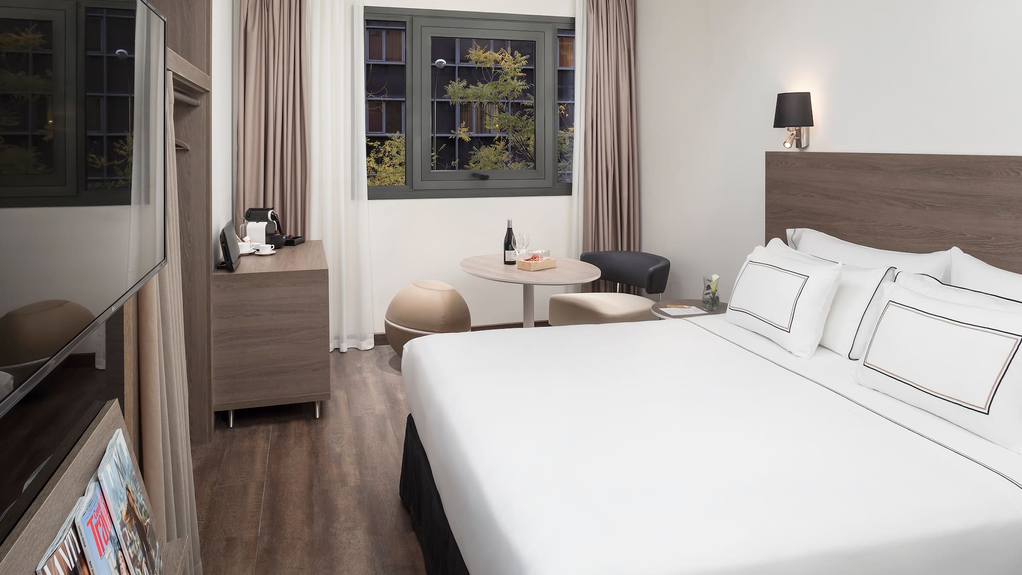 a room with a bed and a table