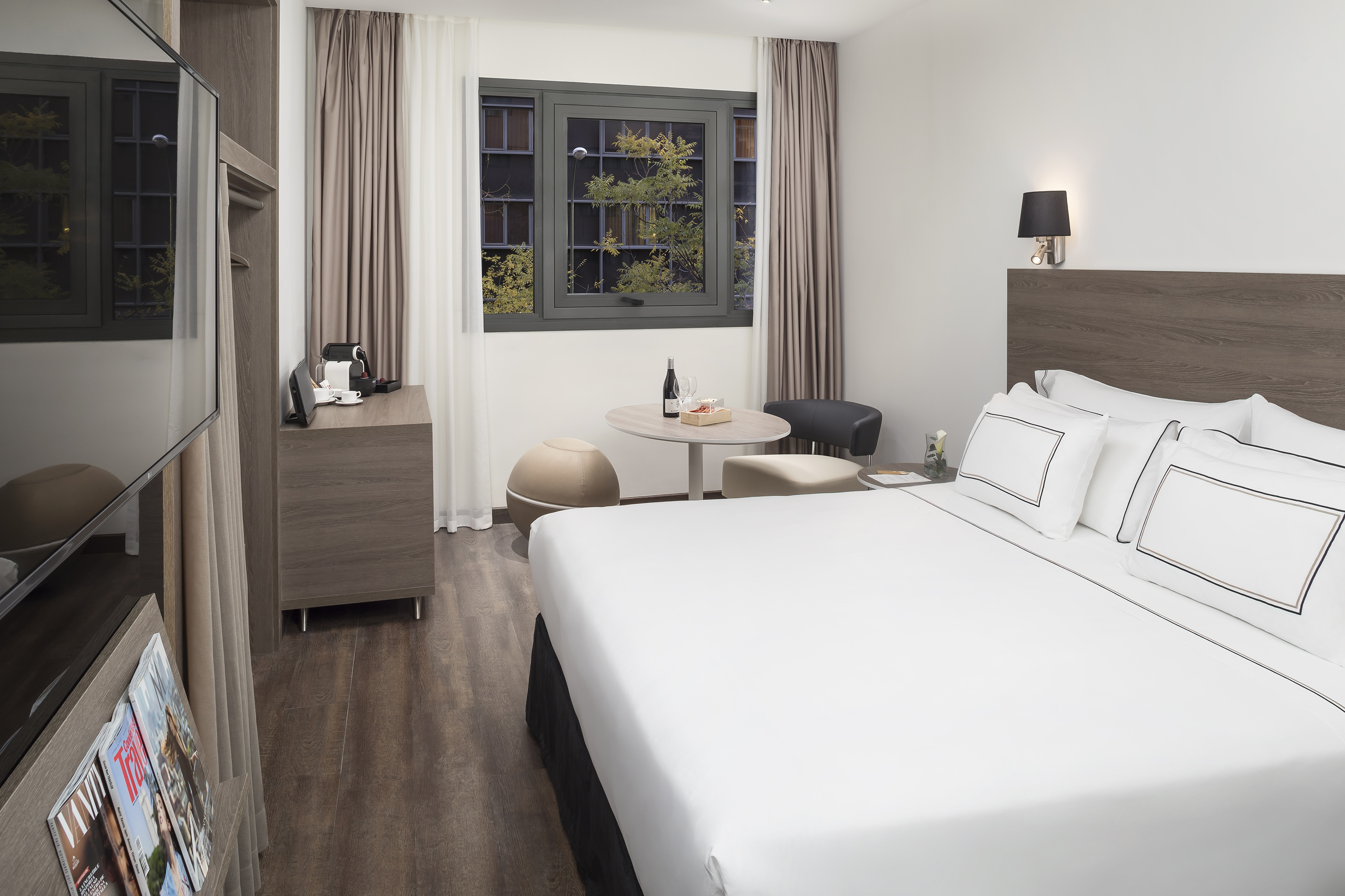 a room with a bed and a table