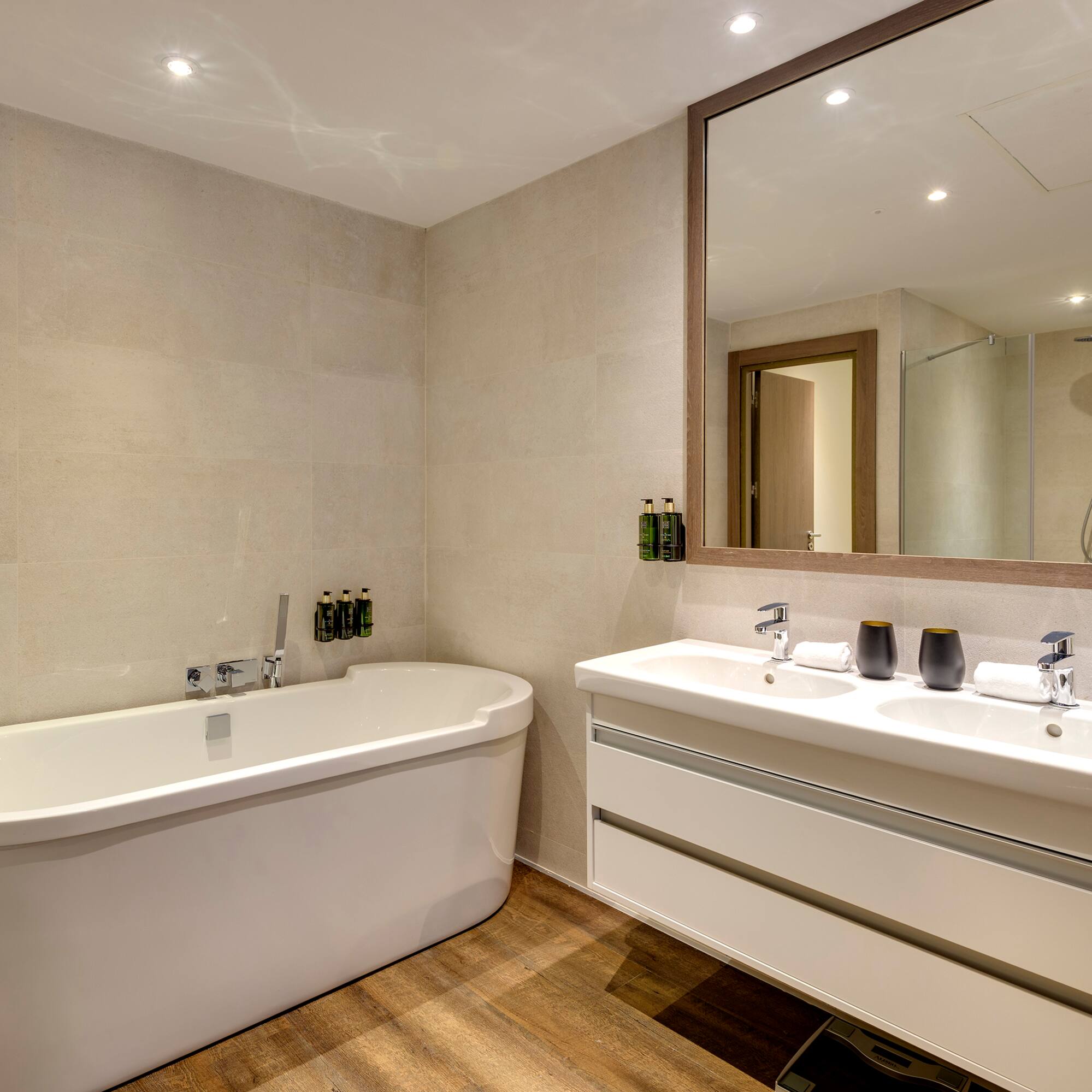 a bathroom with a tub and sink