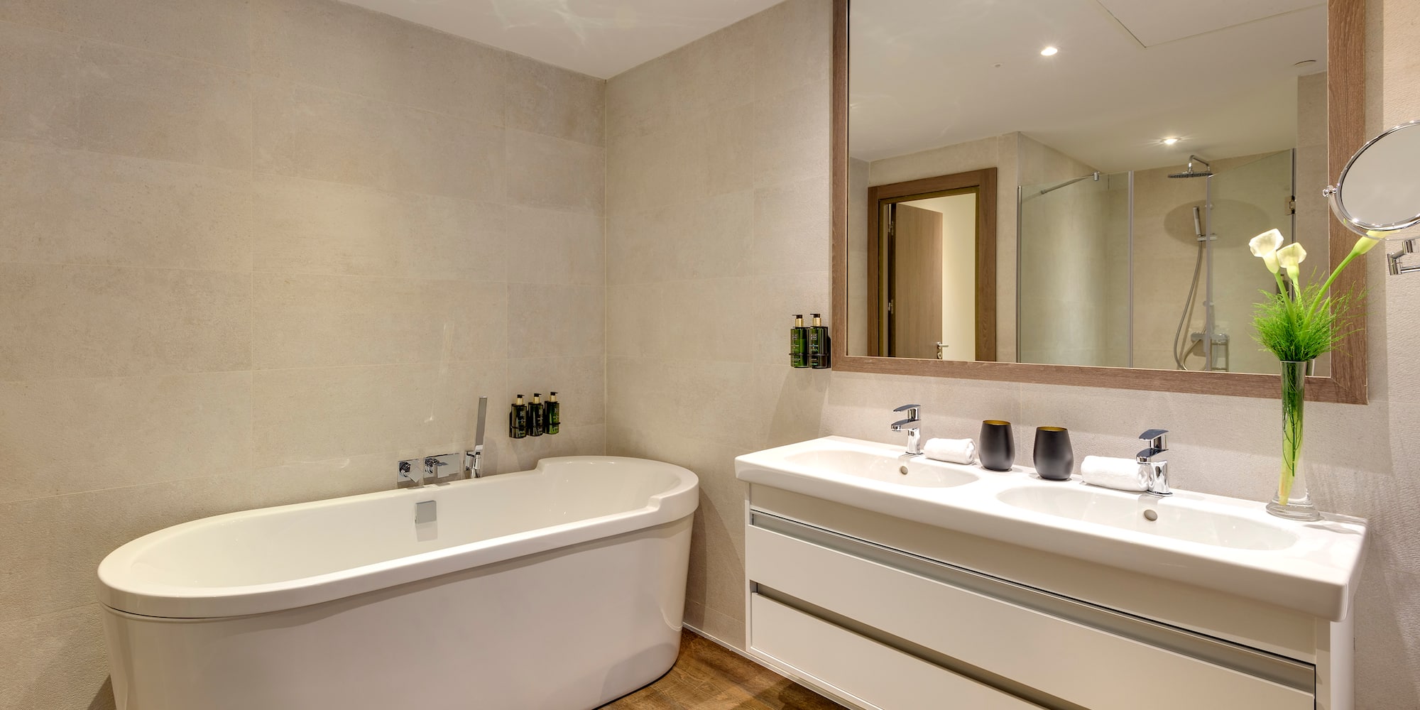 a bathroom with a tub and sink