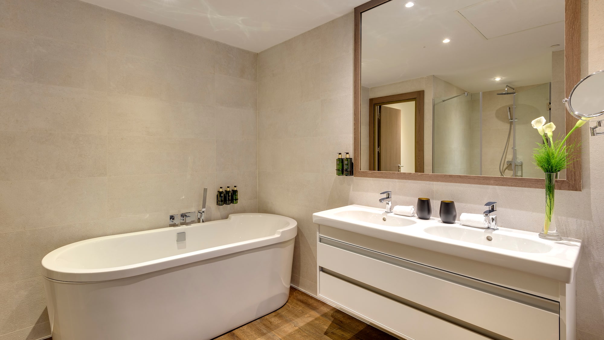 a bathroom with a tub and sink