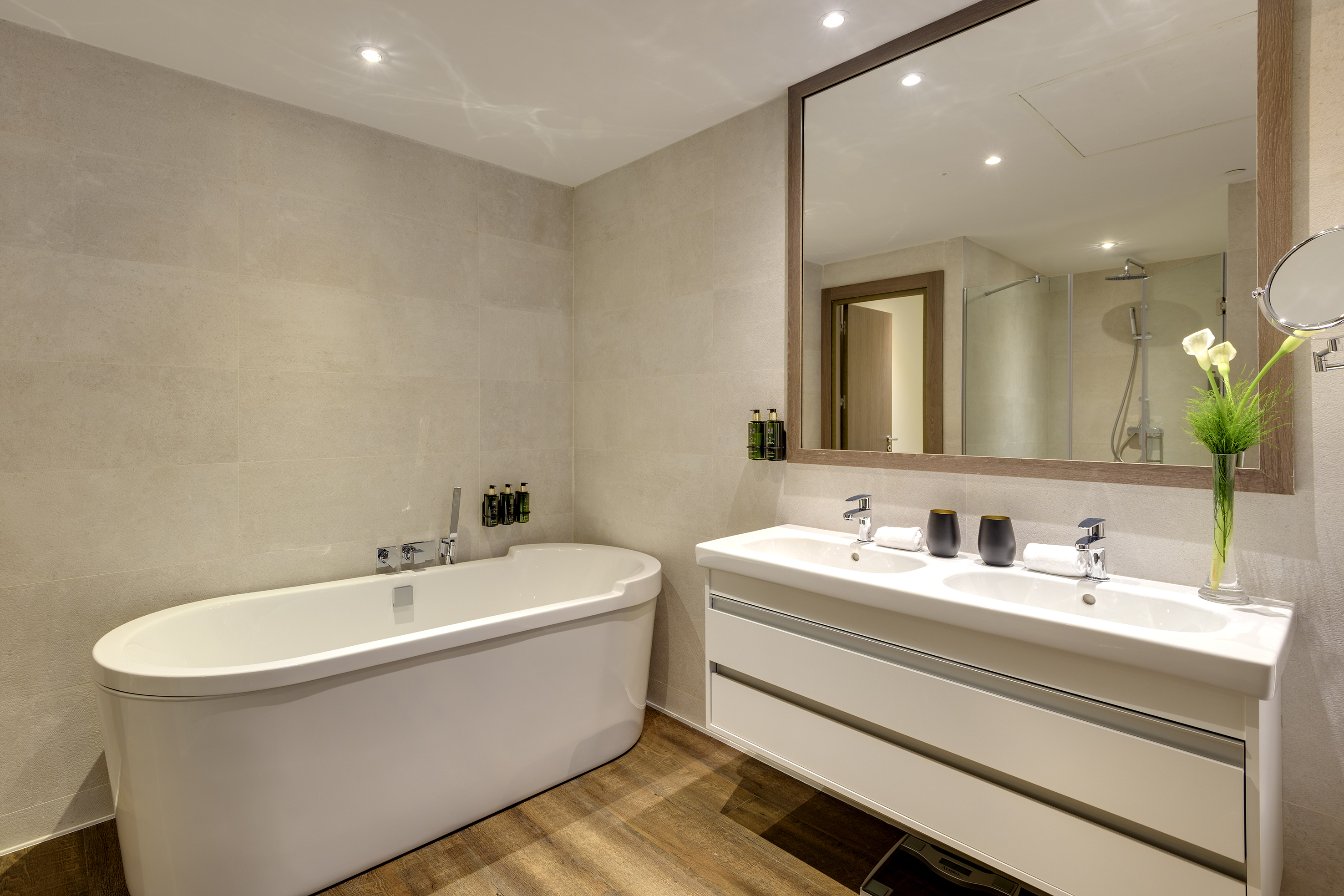 a bathroom with a tub and sink