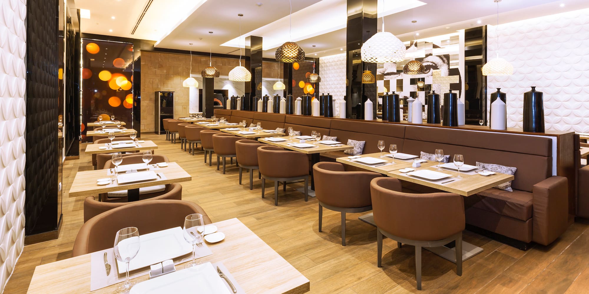 a restaurant with tables and chairs