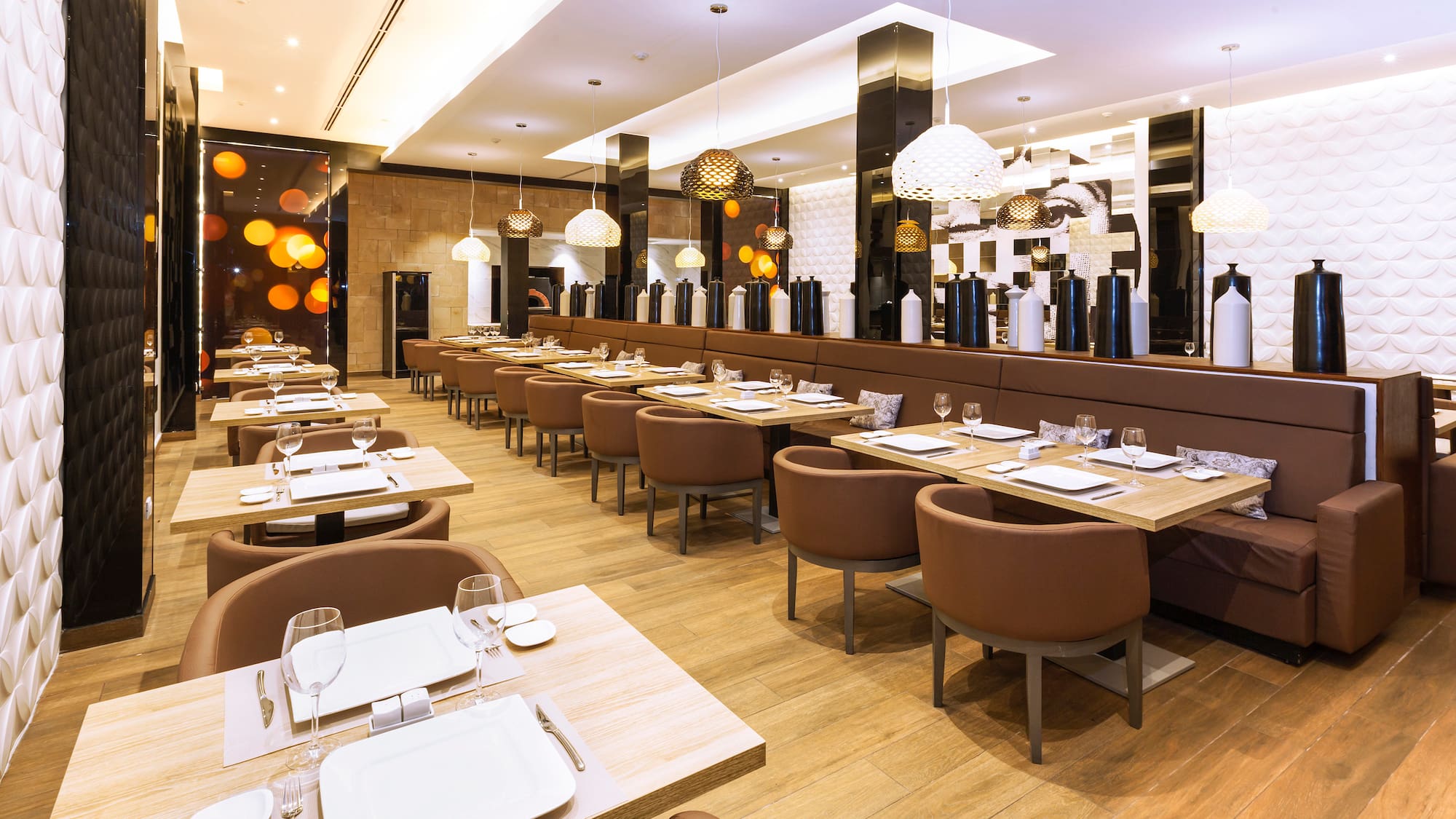 a restaurant with tables and chairs