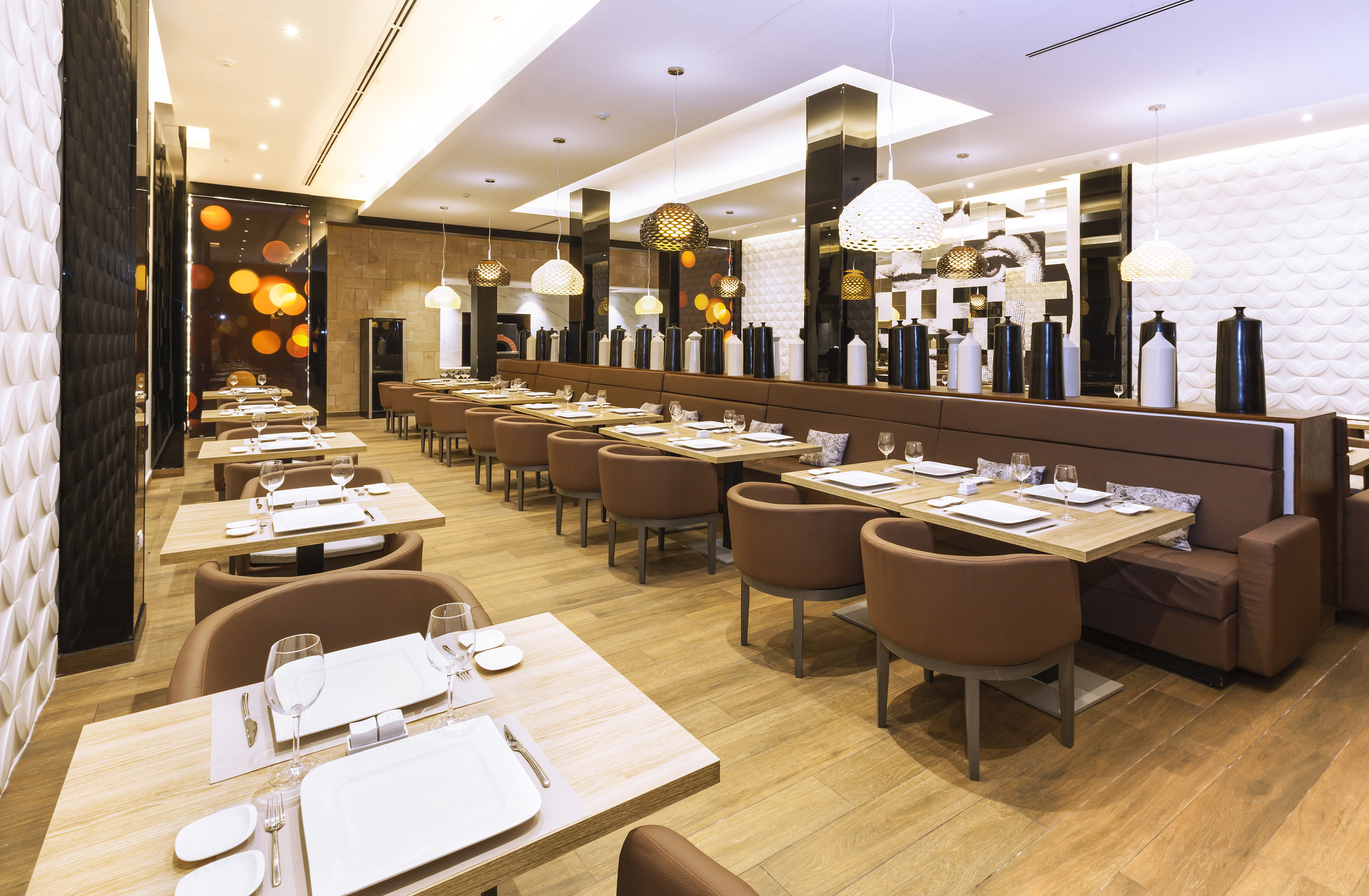 a restaurant with tables and chairs