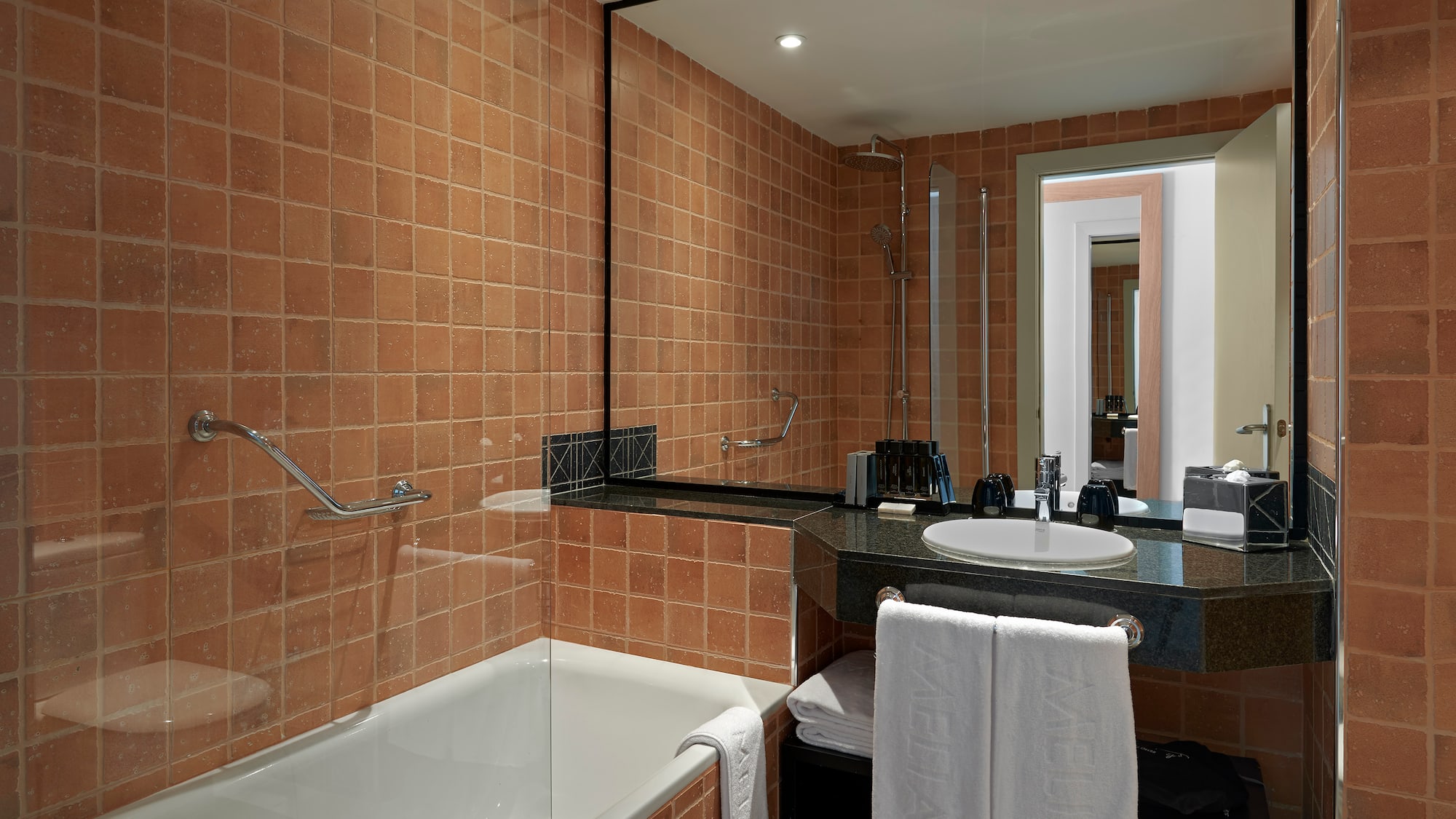 a bathroom with a sink and bathtub