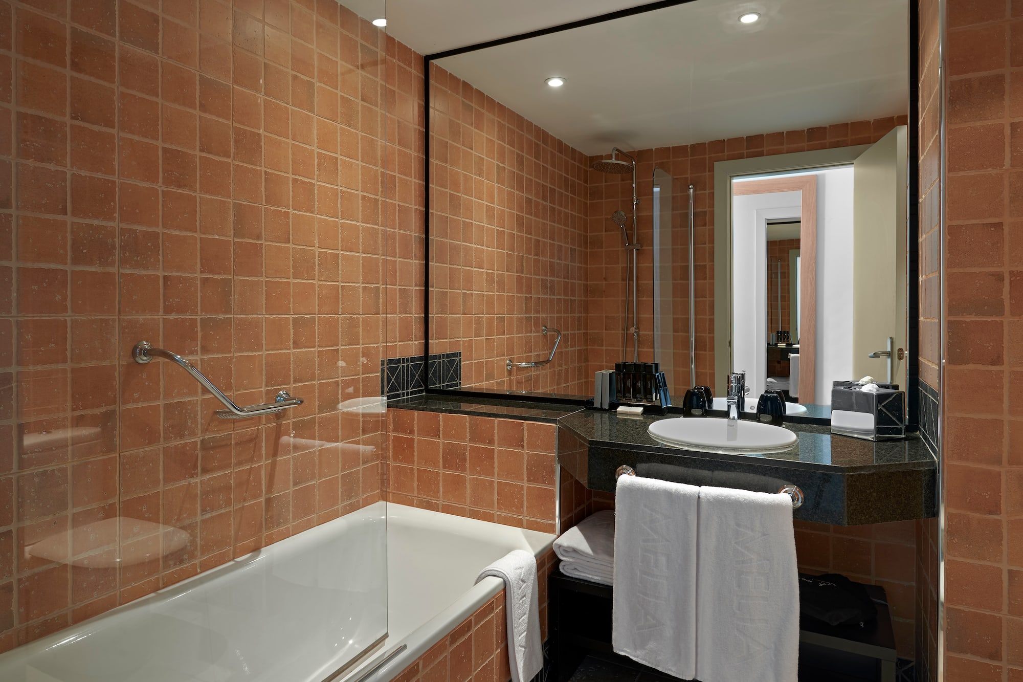 a bathroom with a sink and bathtub