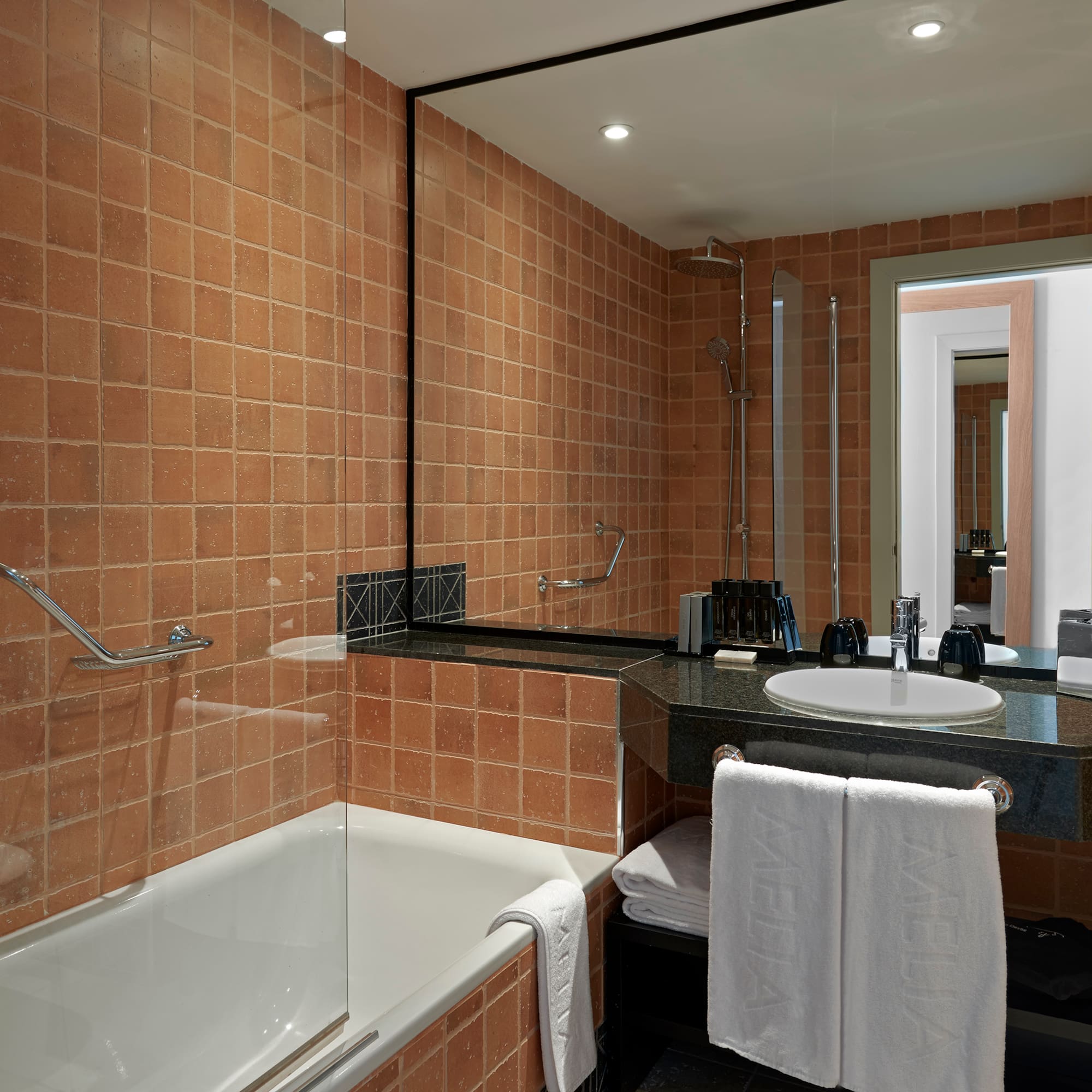 a bathroom with a sink and bathtub