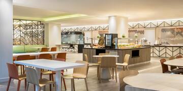 a room with tables and chairs