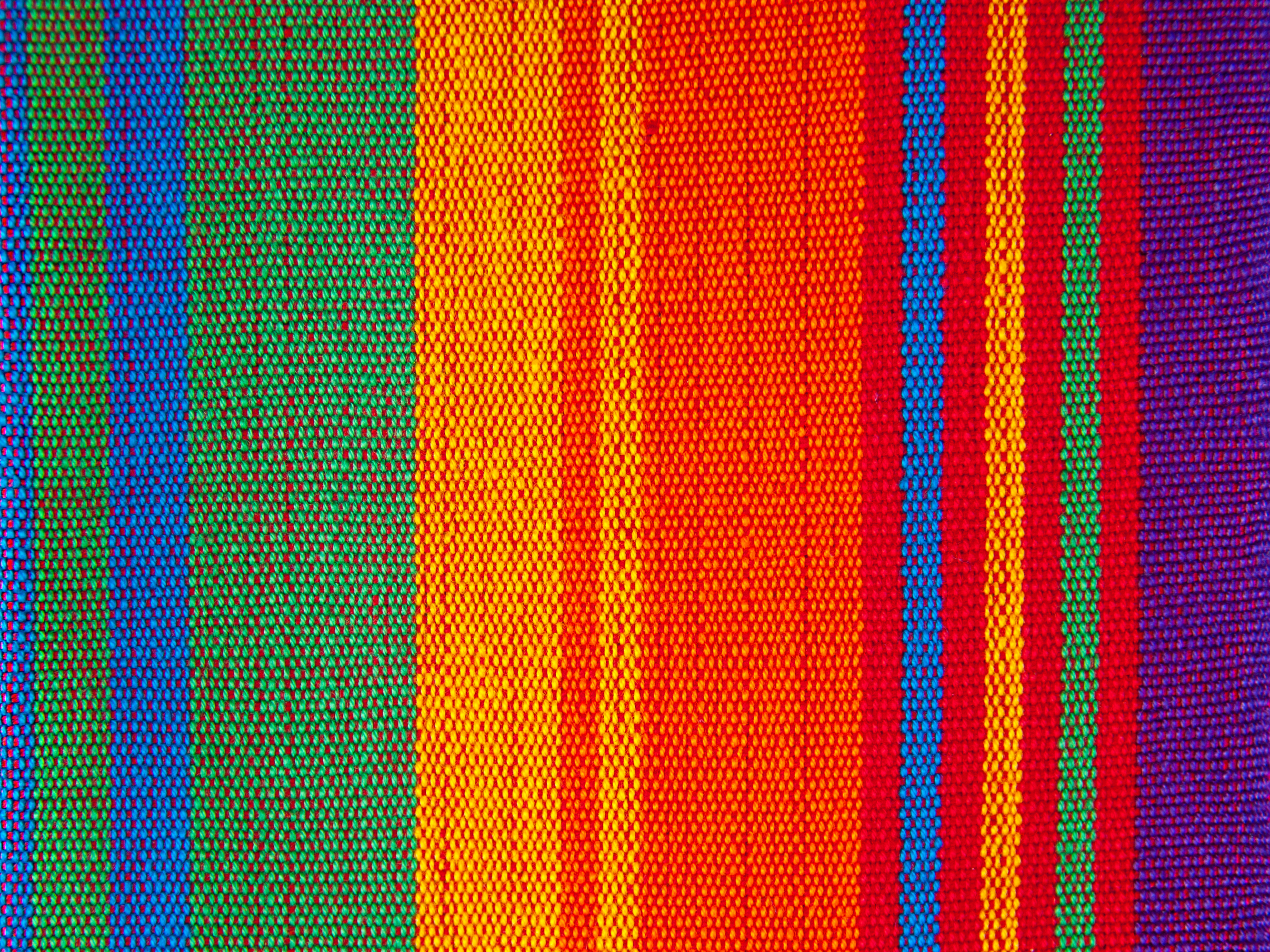 a colorful striped fabric with many colors