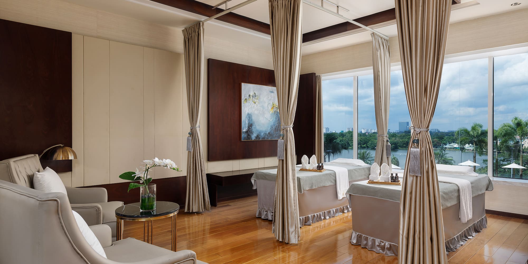 a room with a massage table and chairs