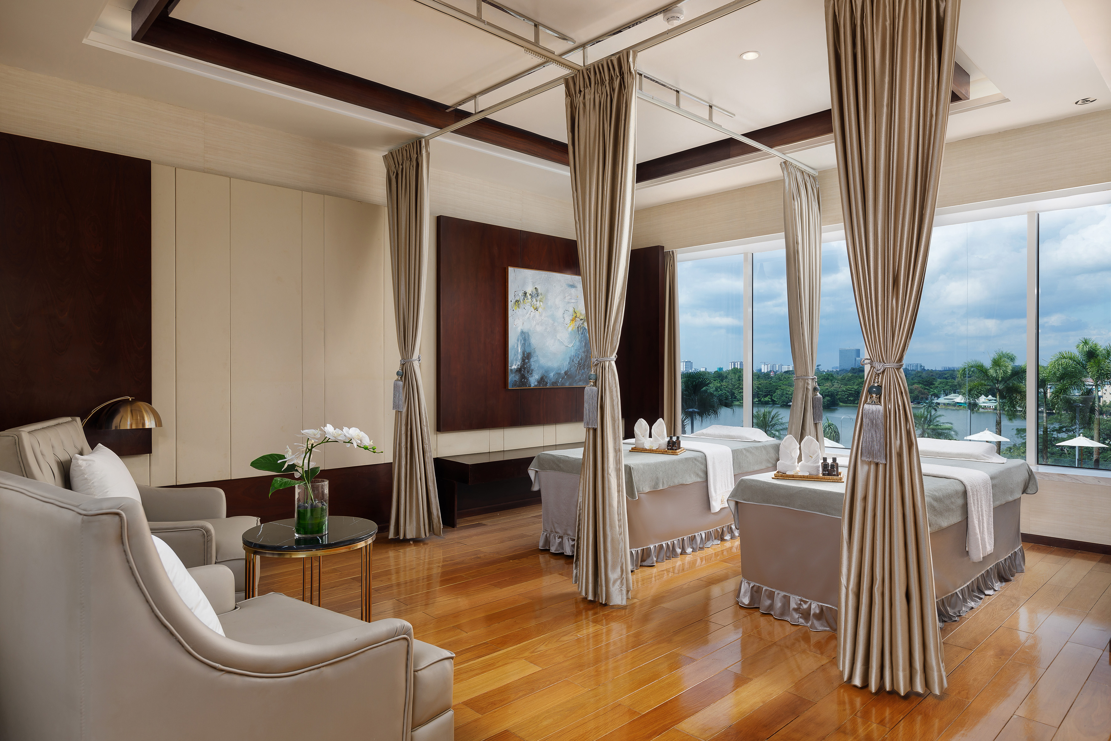 a room with a massage table and chairs