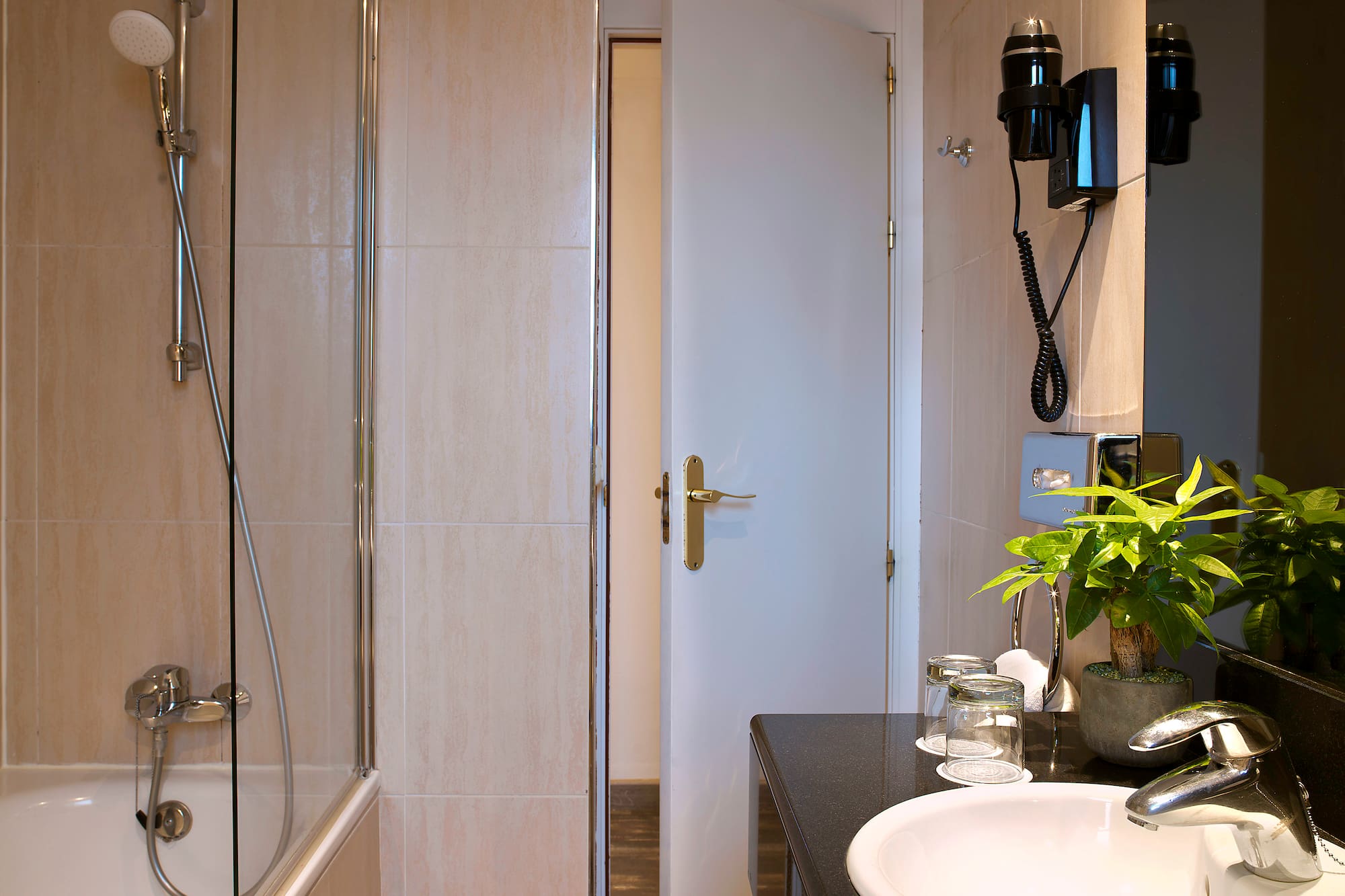 a bathroom with a sink and shower