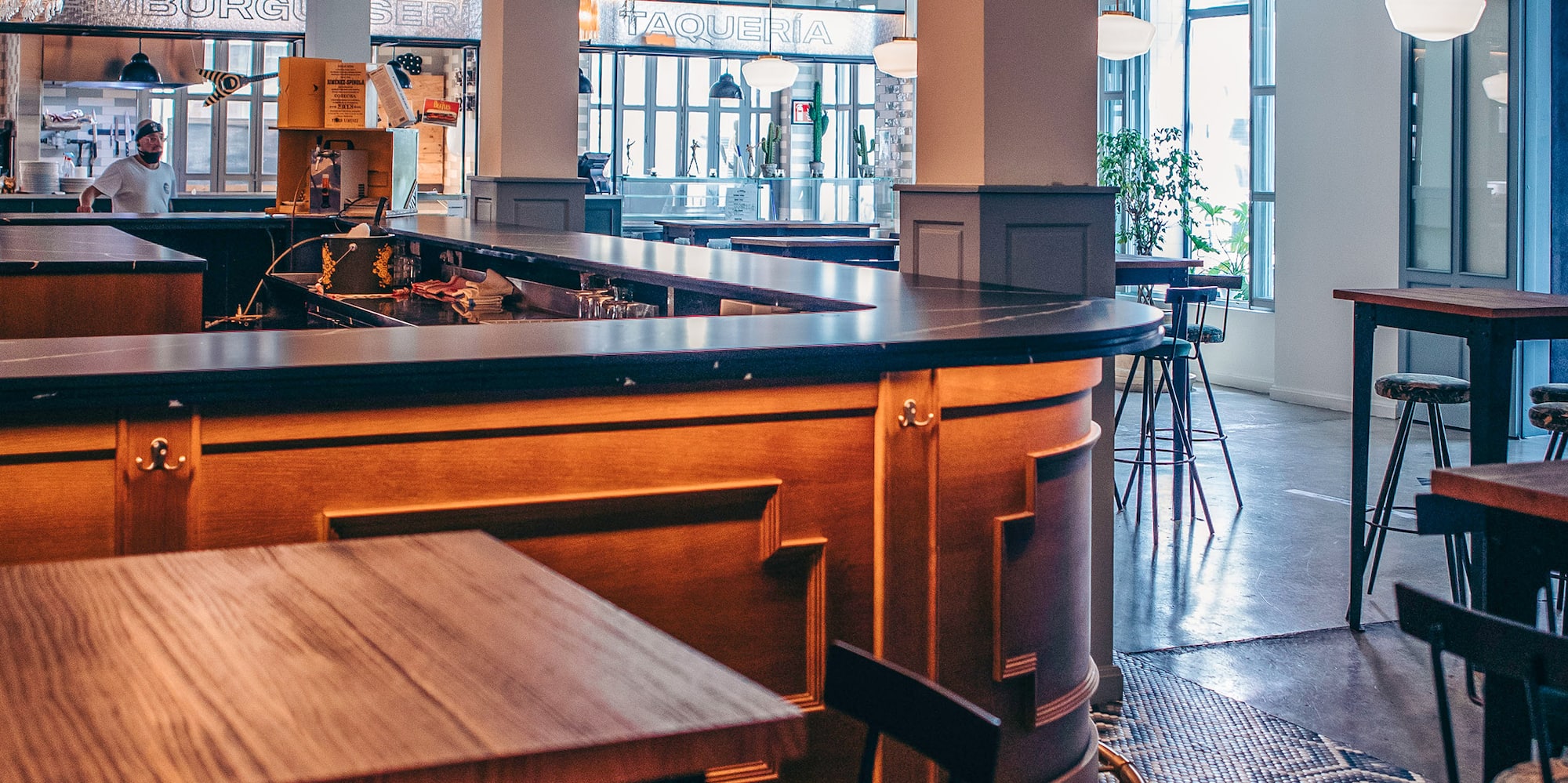 a room with tables and chairs