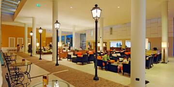 a large room with a large table and chairs