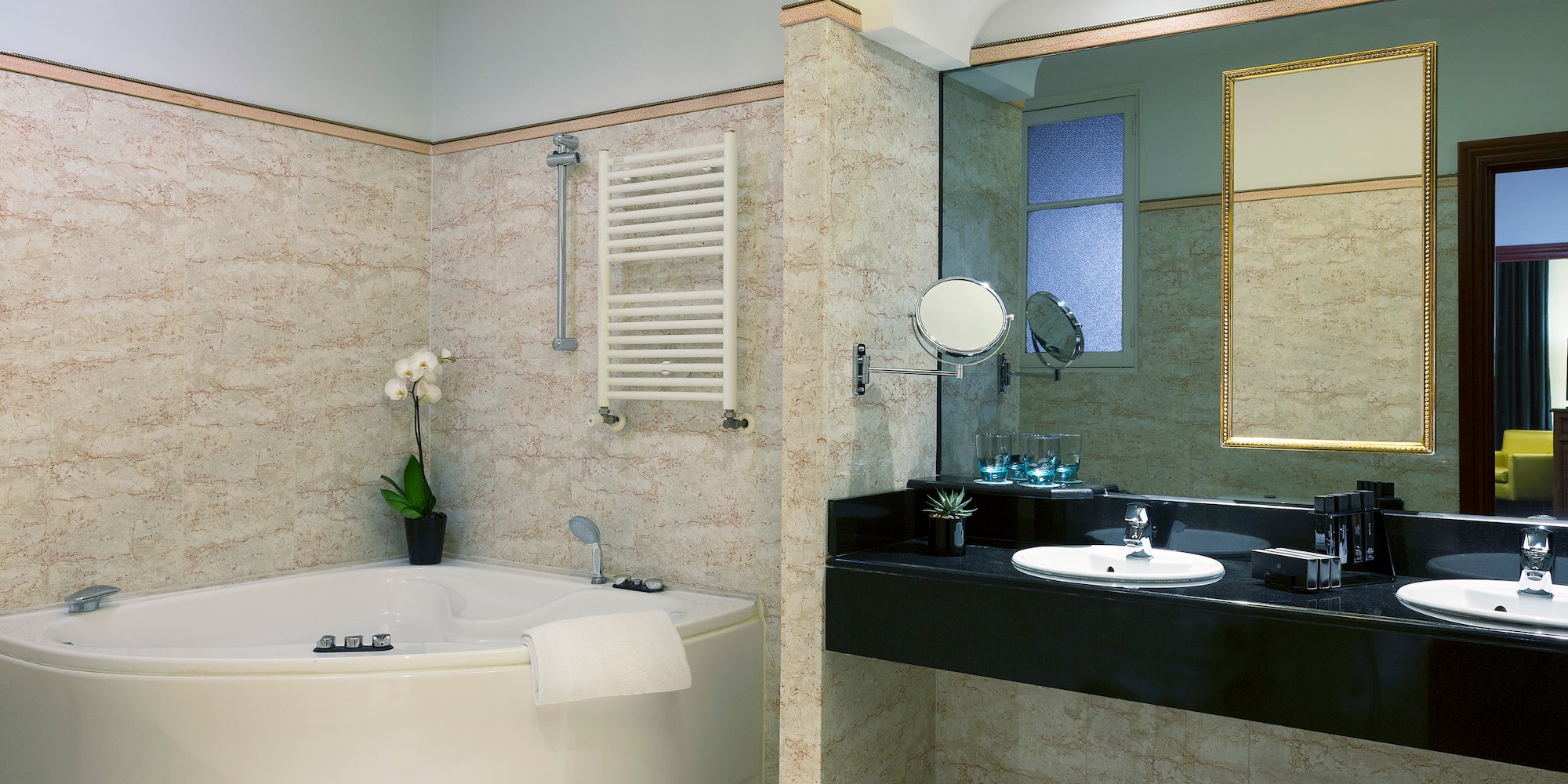 a bathroom with a tub and sink