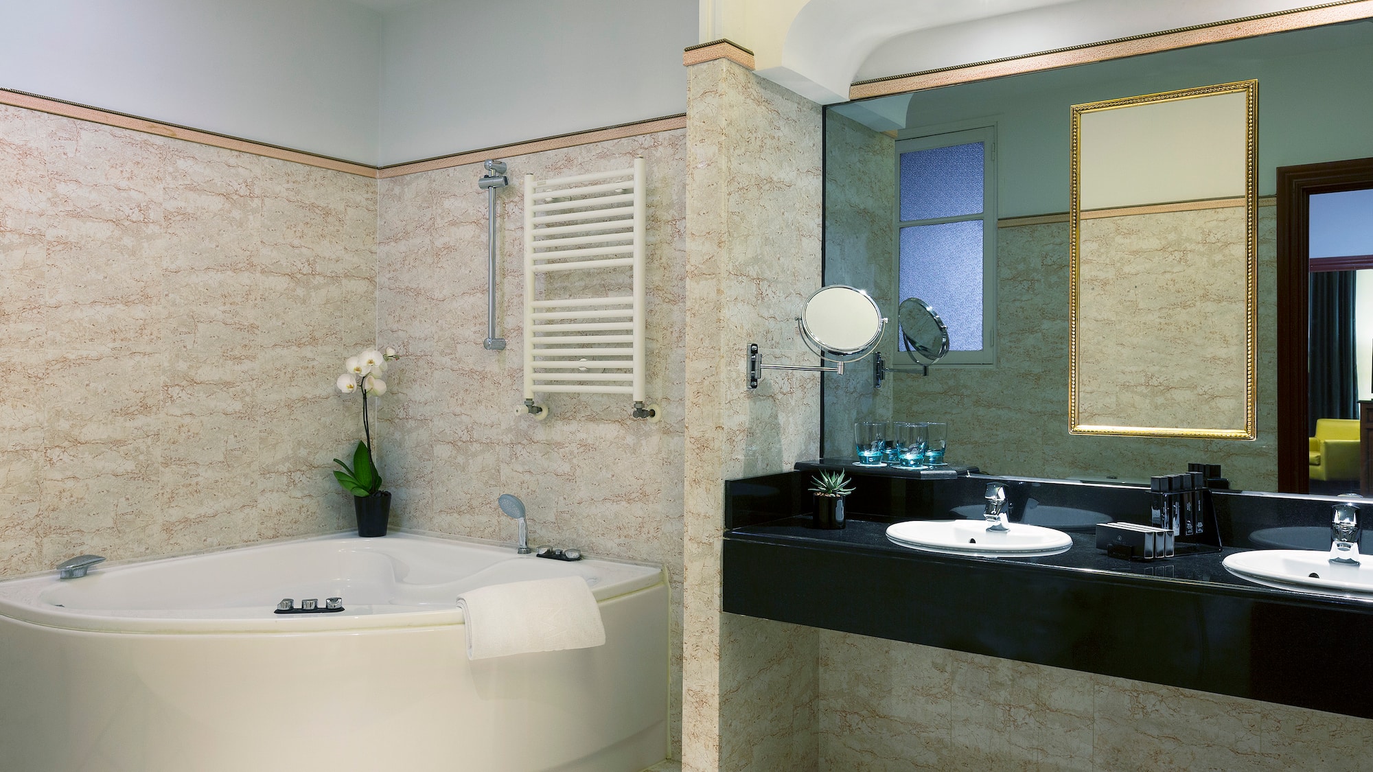 a bathroom with a tub and sink