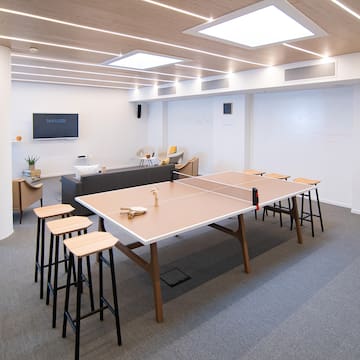 a ping pong table in a room