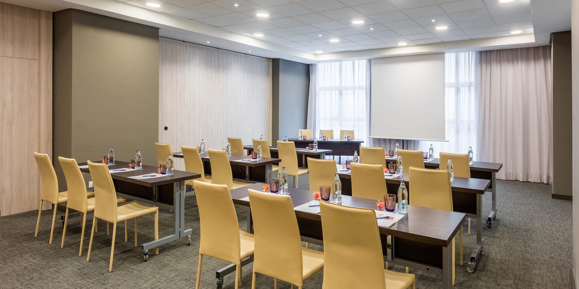 a room with tables and chairs