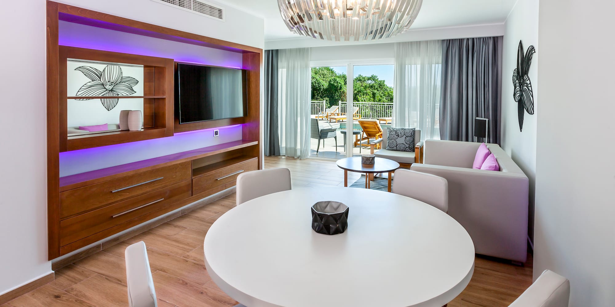 a room with a table and chairs