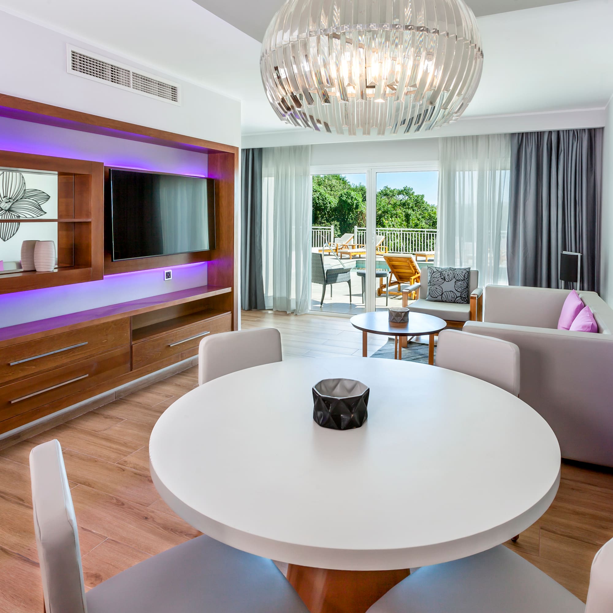 a room with a table and chairs