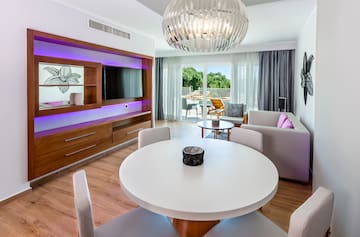 a room with a table and chairs