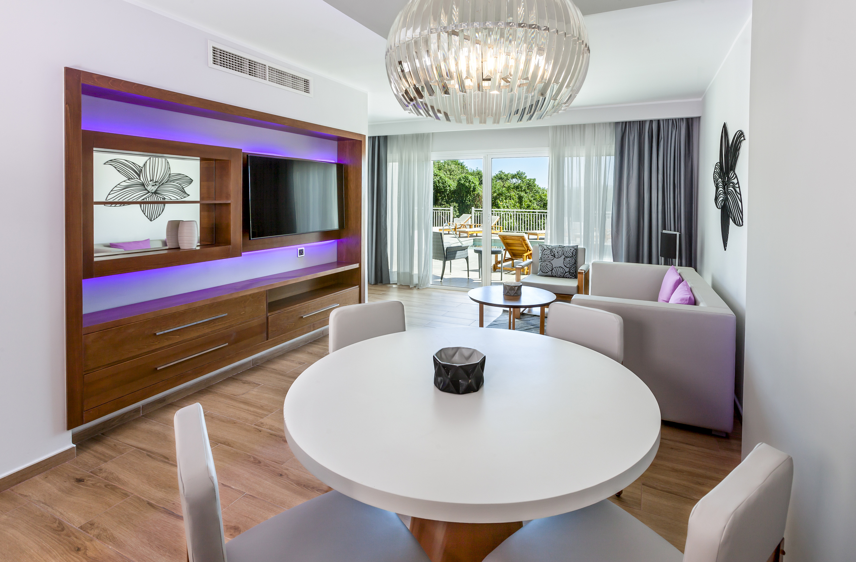 a room with a table and chairs