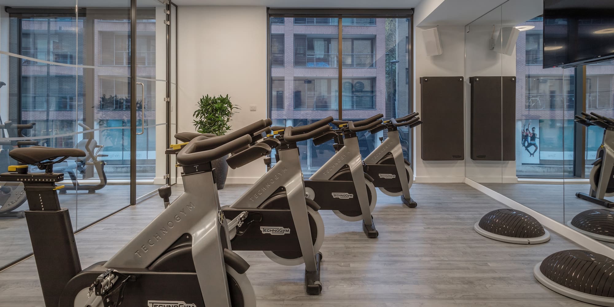a room with exercise bikes