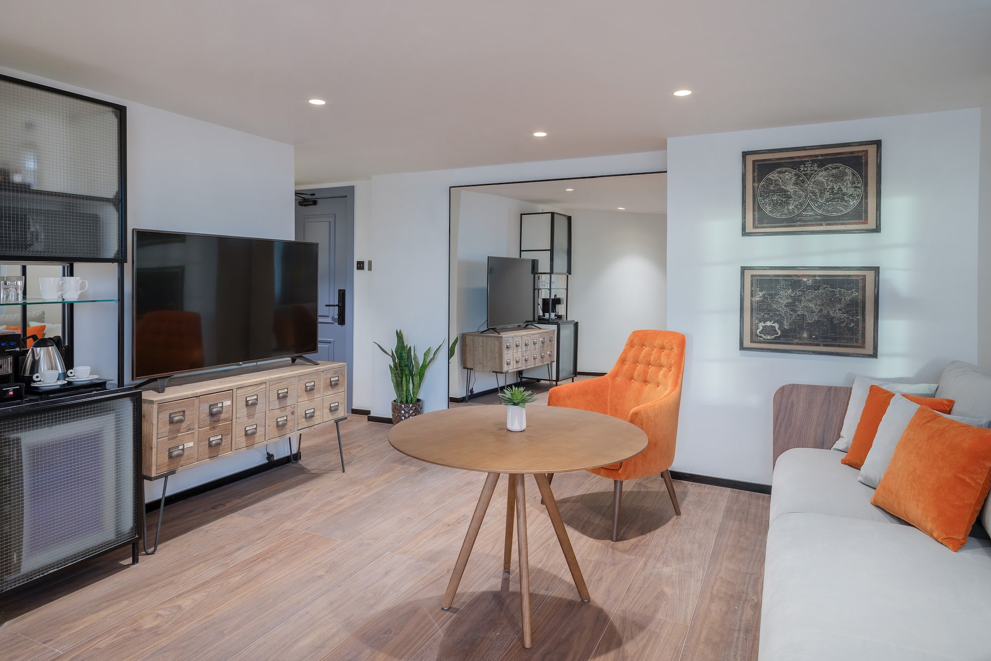 a living room with a tv and a couch