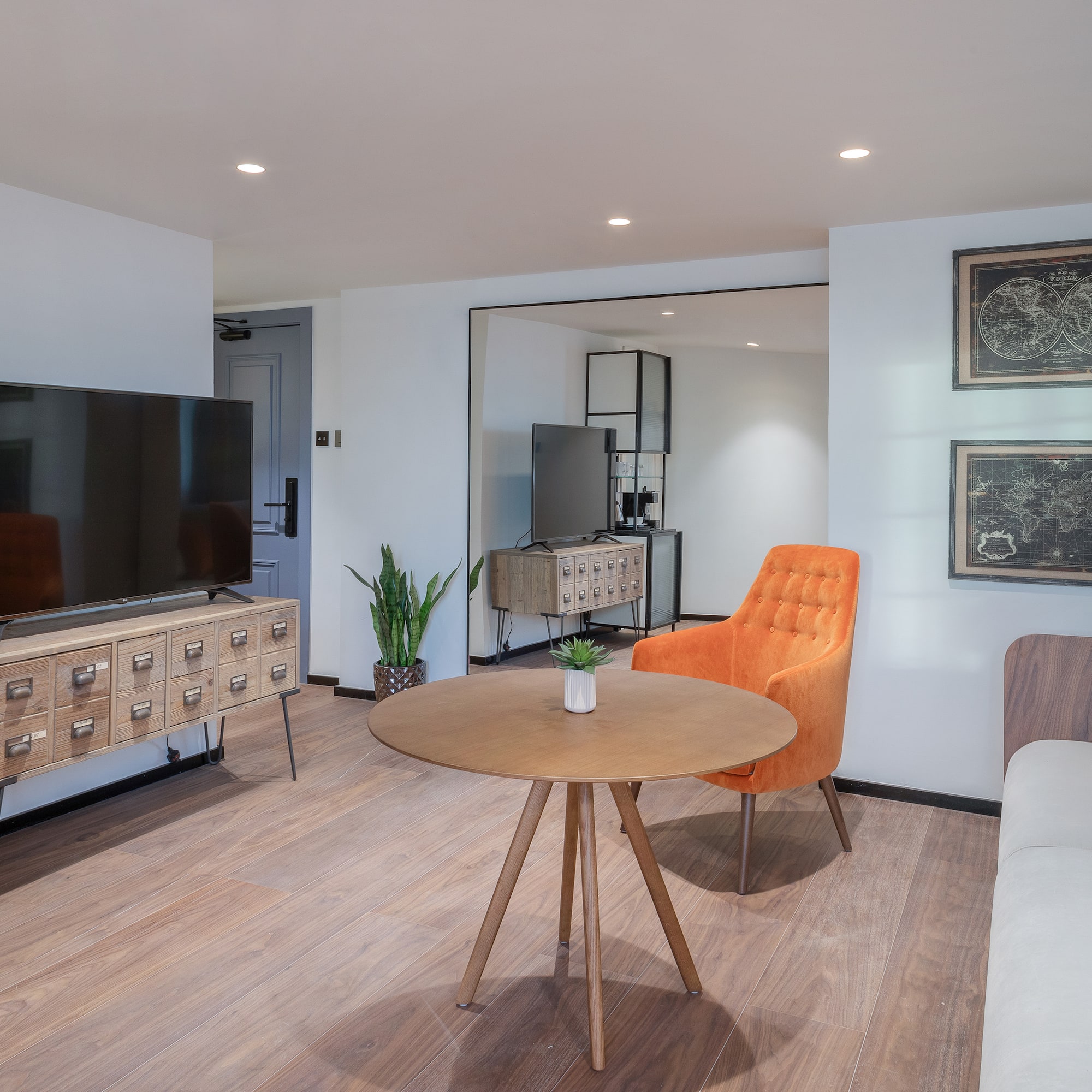 a living room with a tv and a couch