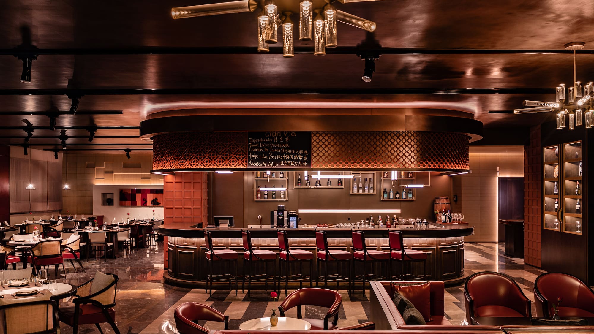 a bar with chairs and tables