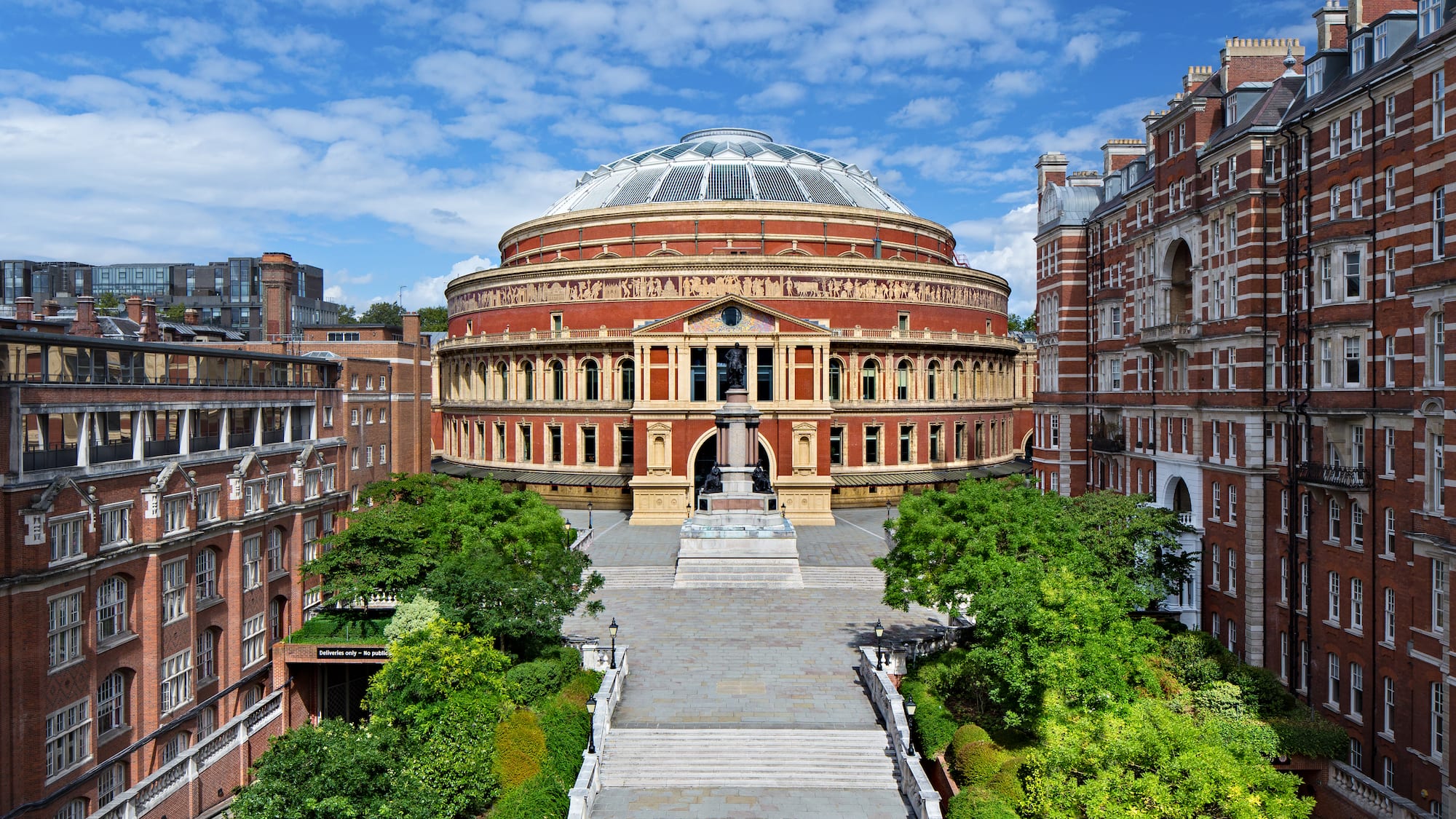 Royal Albert Hall with a dome and trees