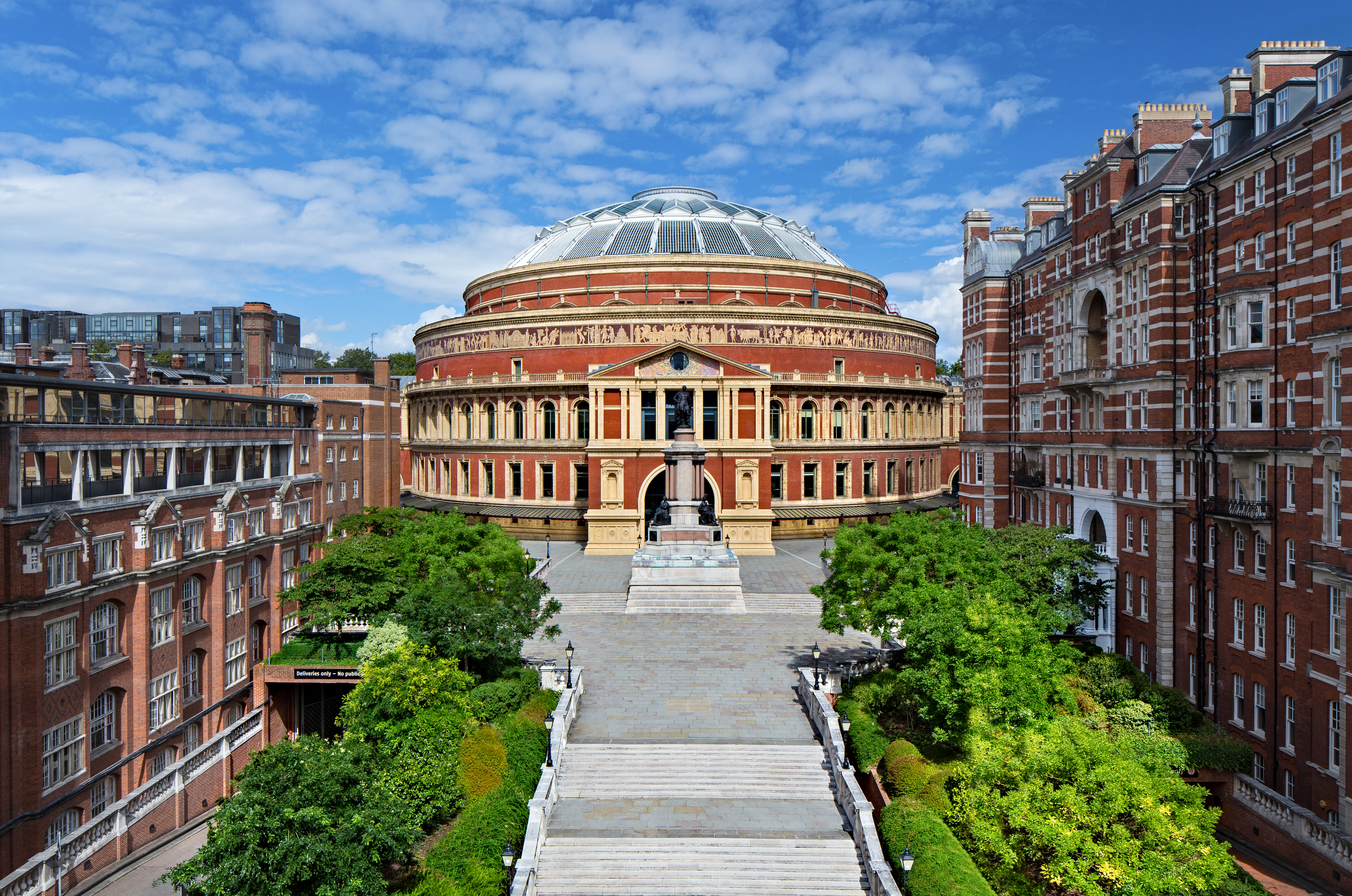 Royal Albert Hall with a dome and trees
