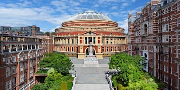 Royal Albert Hall with a dome and trees