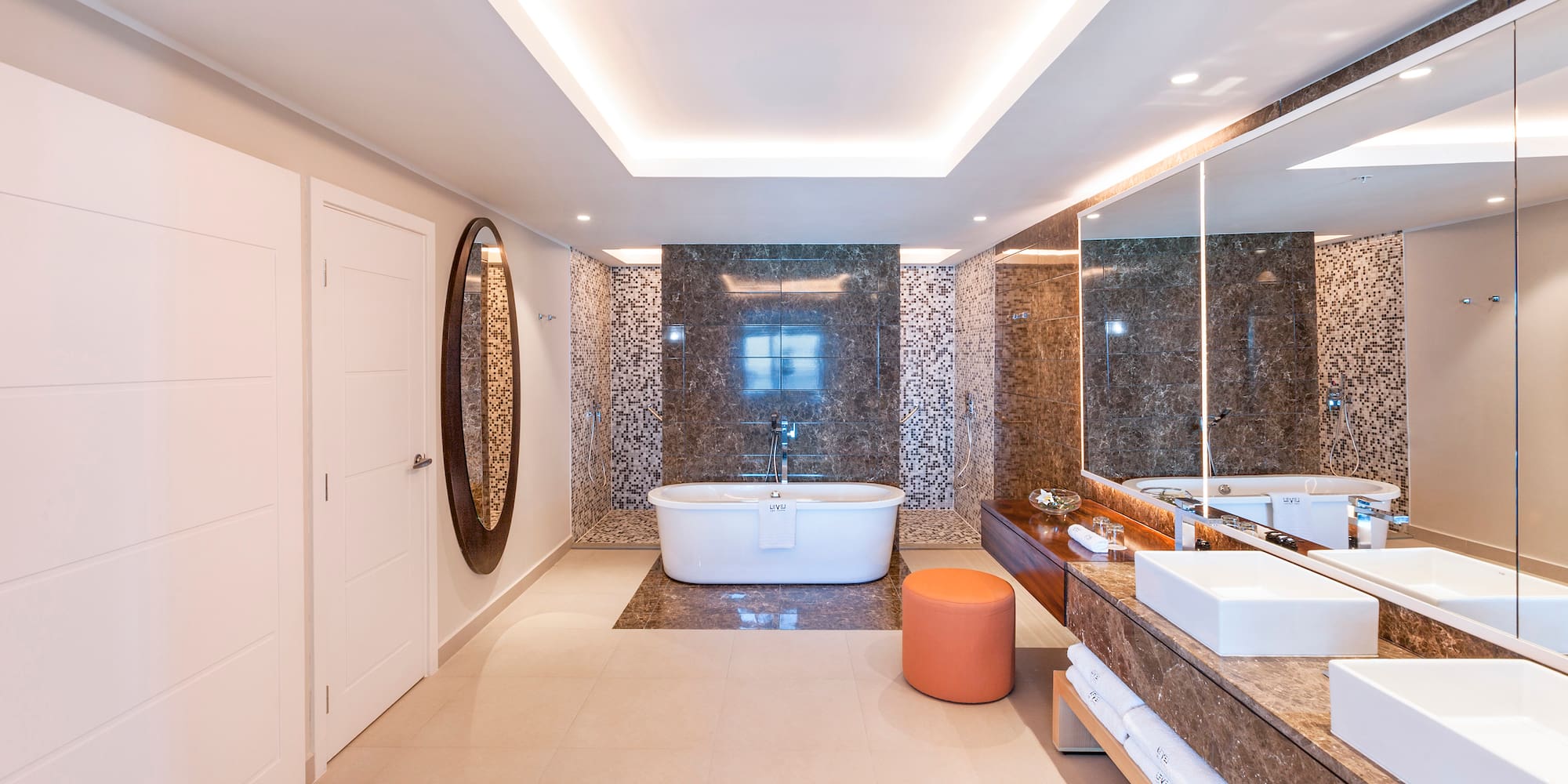 a bathroom with a tub and sink