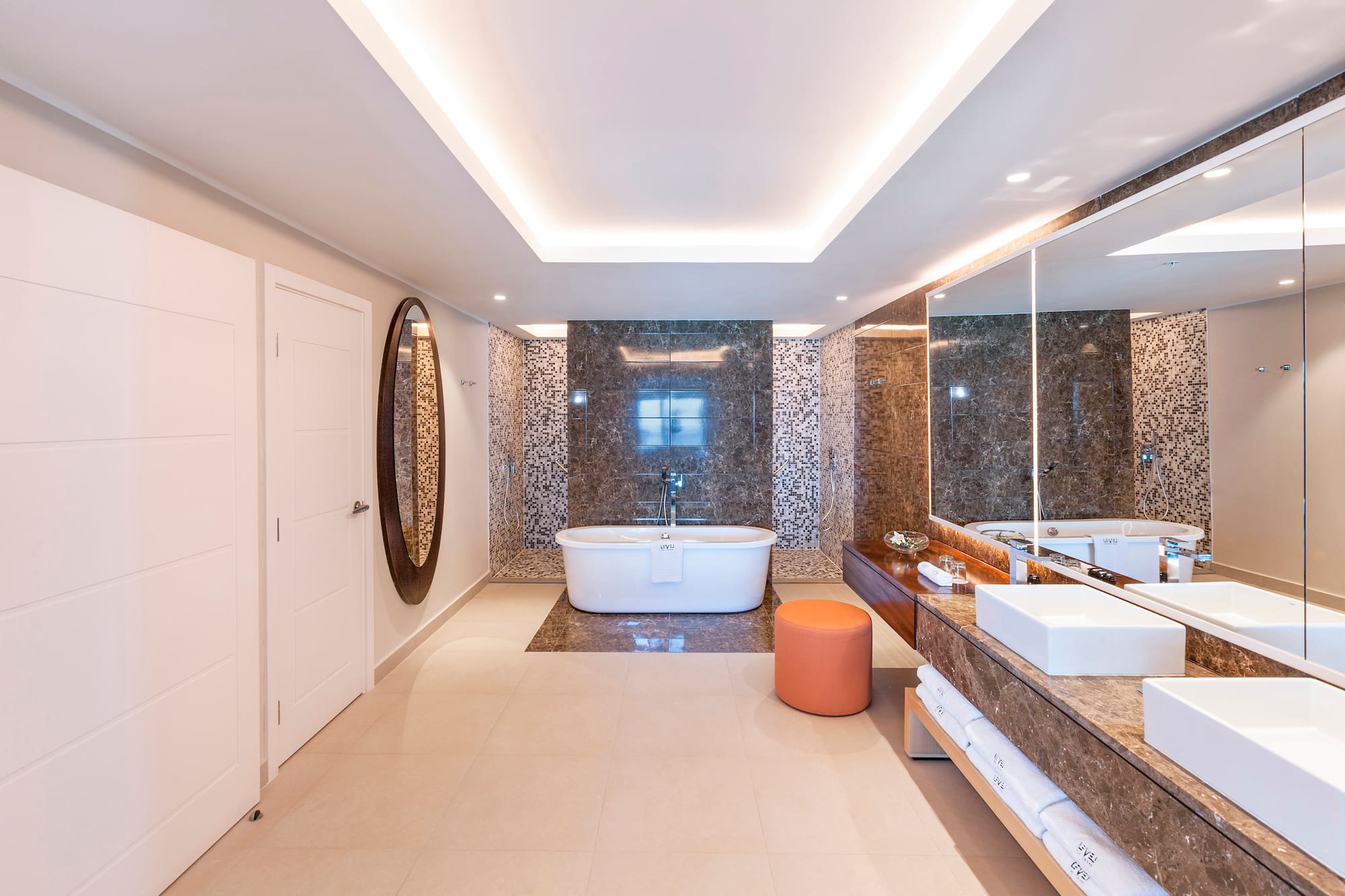 a bathroom with a tub and sink