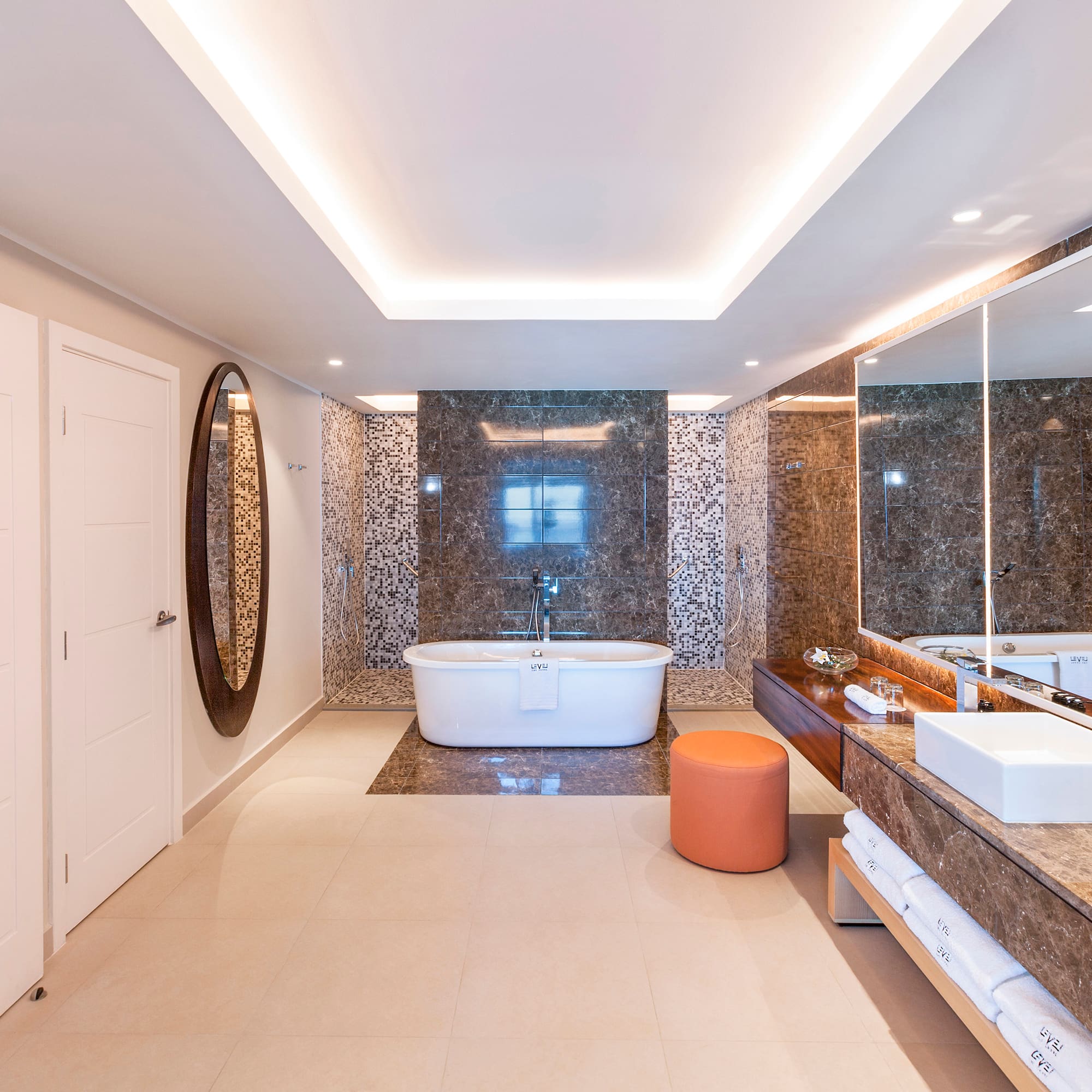 a bathroom with a tub and sink