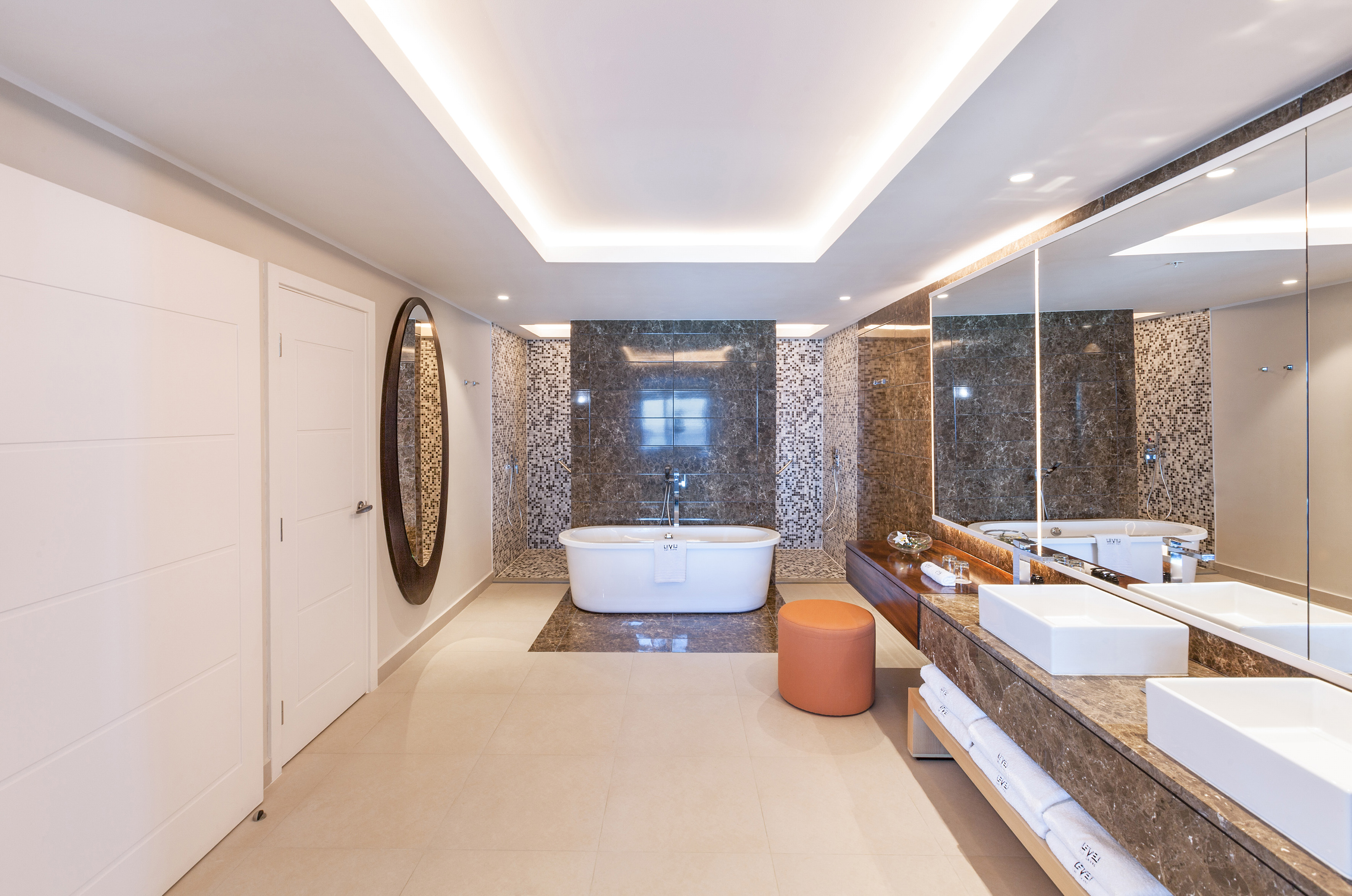 a bathroom with a tub and sink