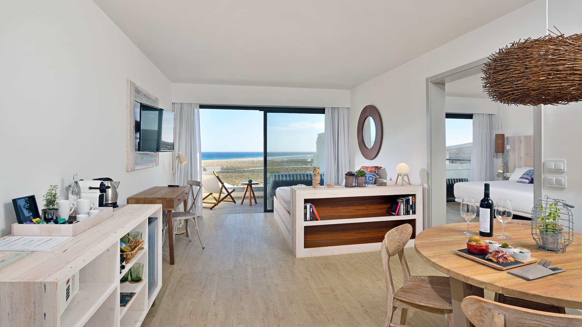 a room with a television and a table