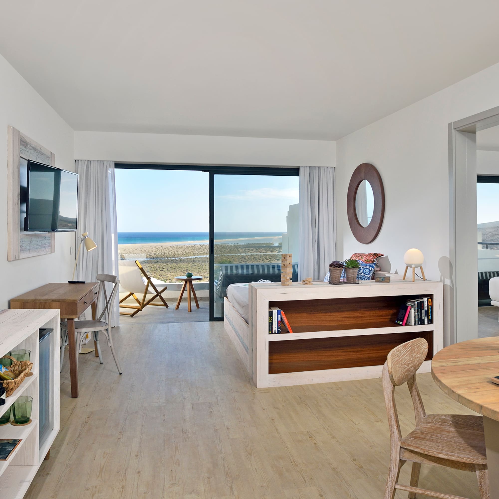 a room with a television and a table