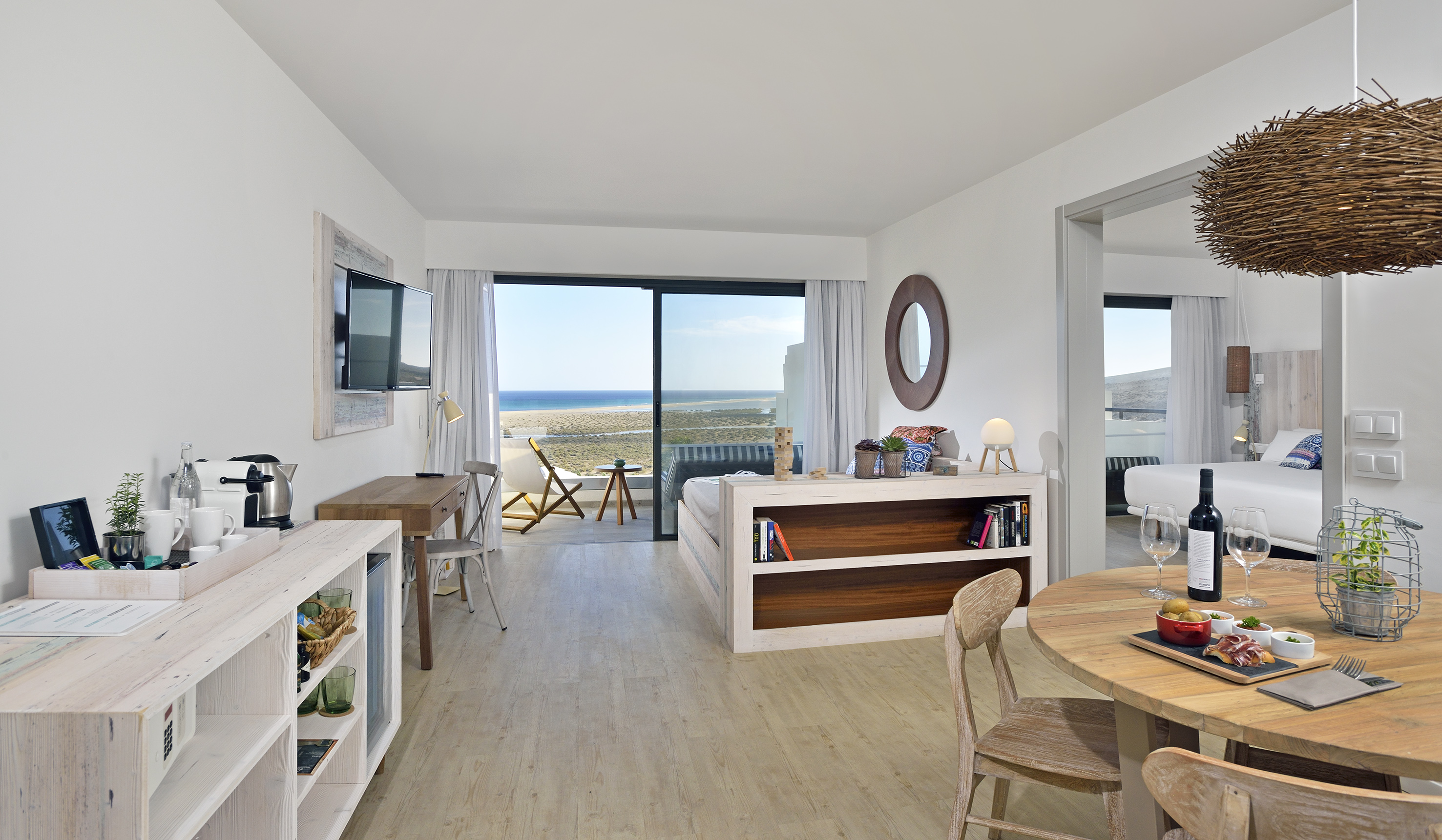 a room with a television and a table