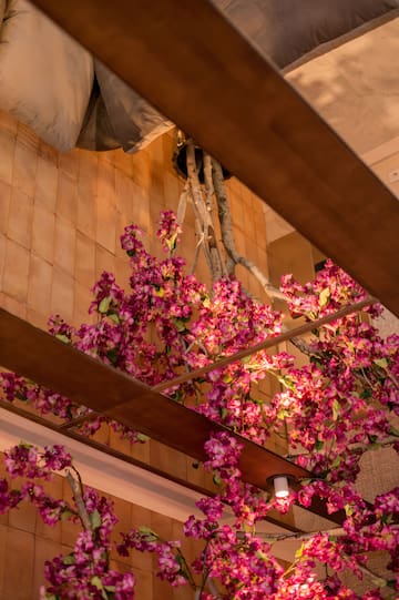 a pink flowers from a ceiling