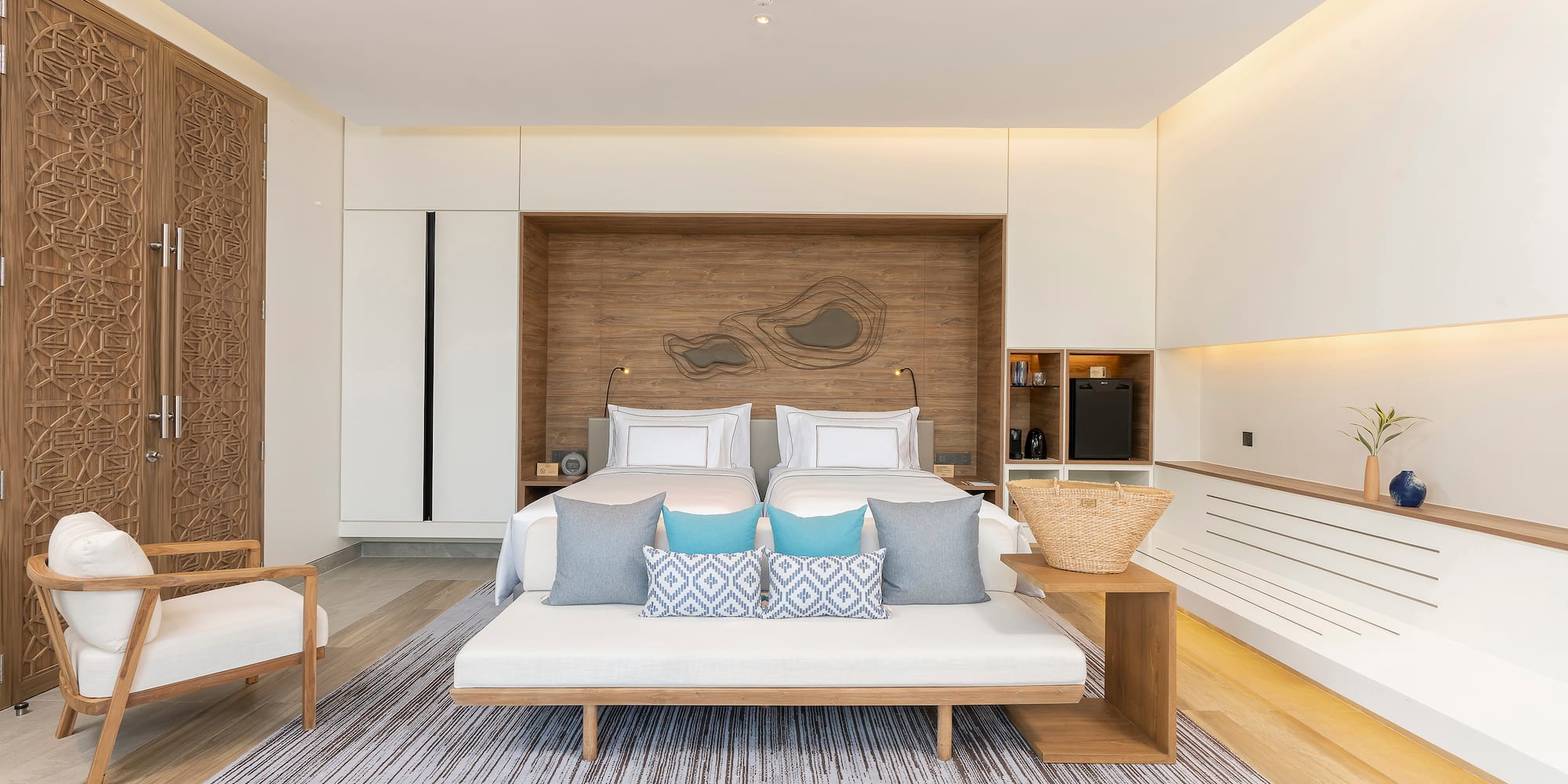 a room with a bed and a fan