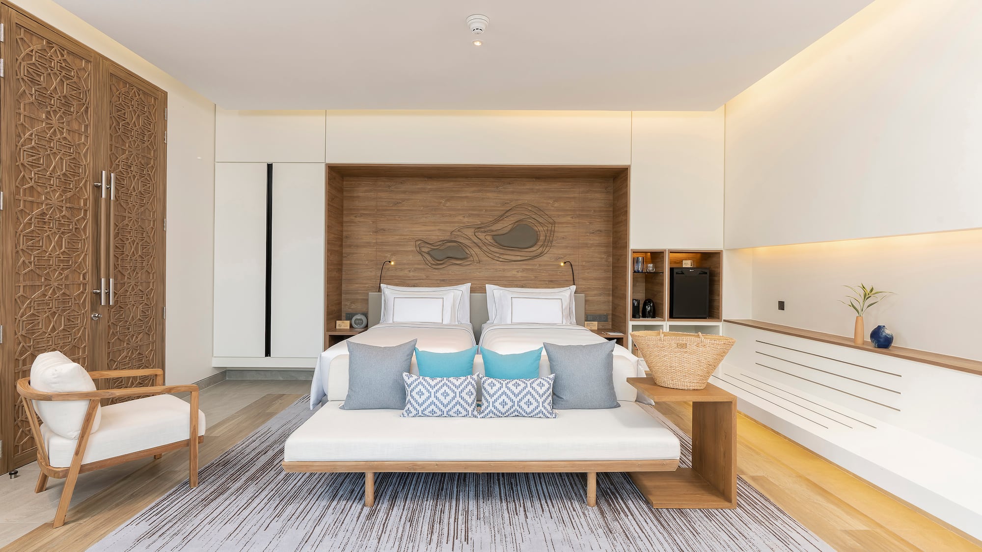 a room with a bed and a fan