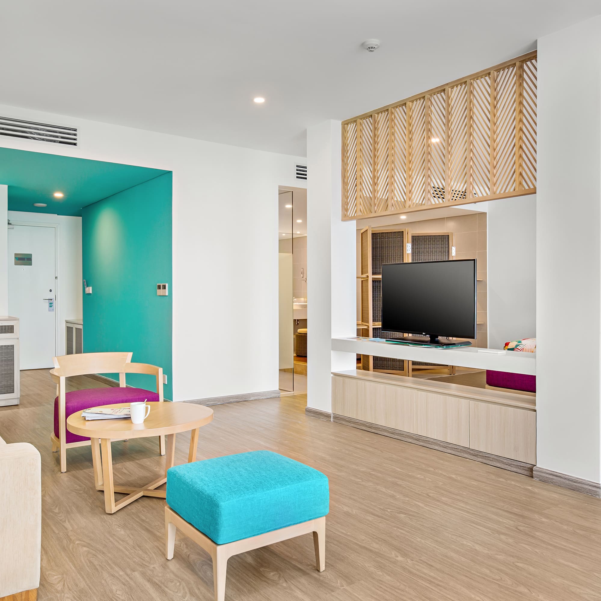 a room with a television and a table