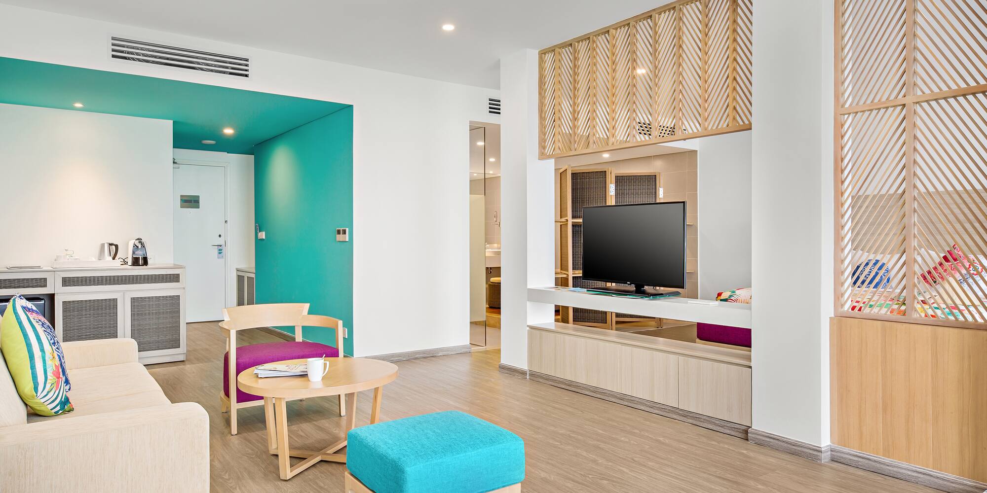 a room with a television and a table