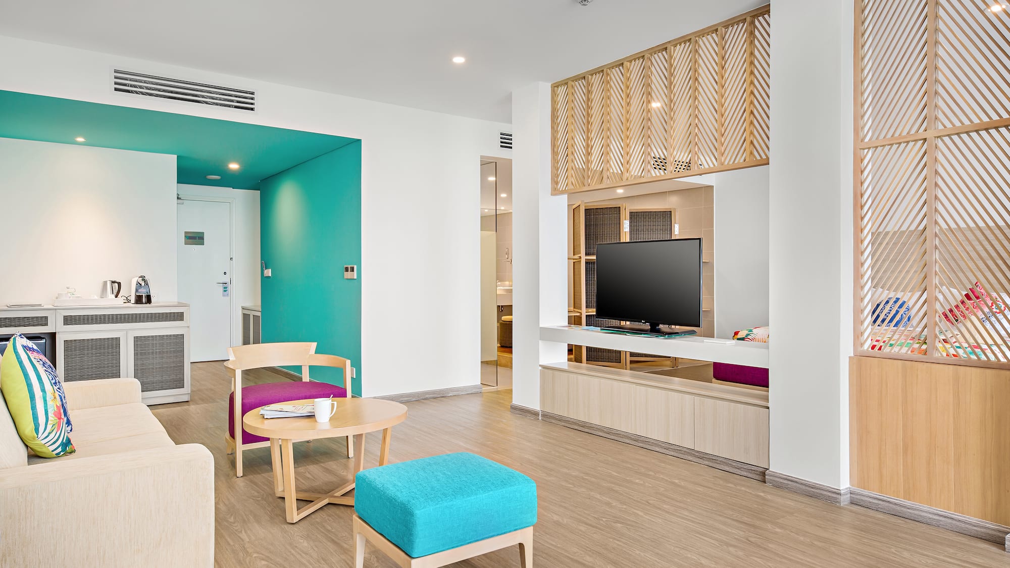 a room with a television and a table