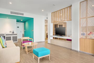 a room with a television and a table