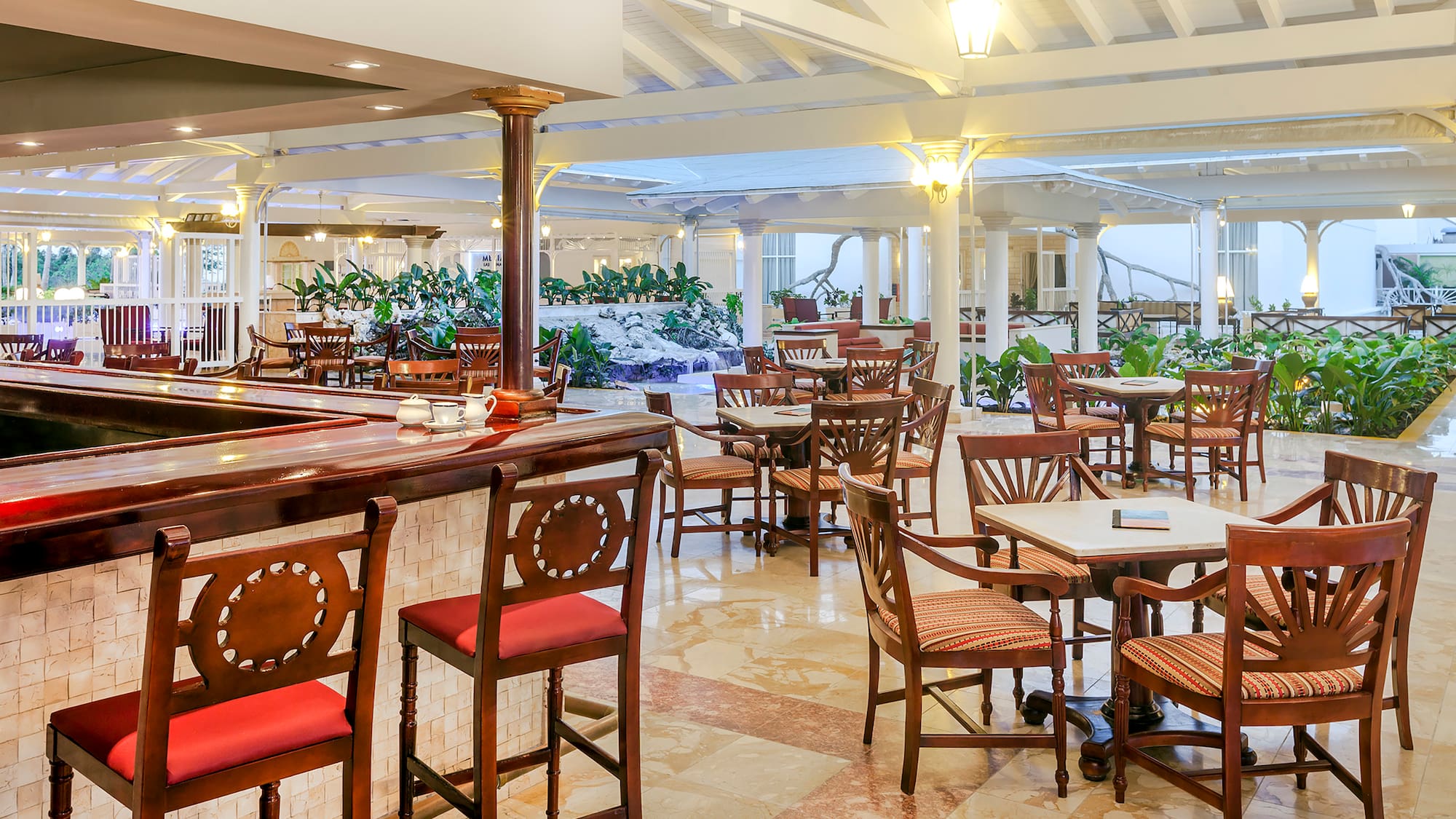 a room with tables and chairs