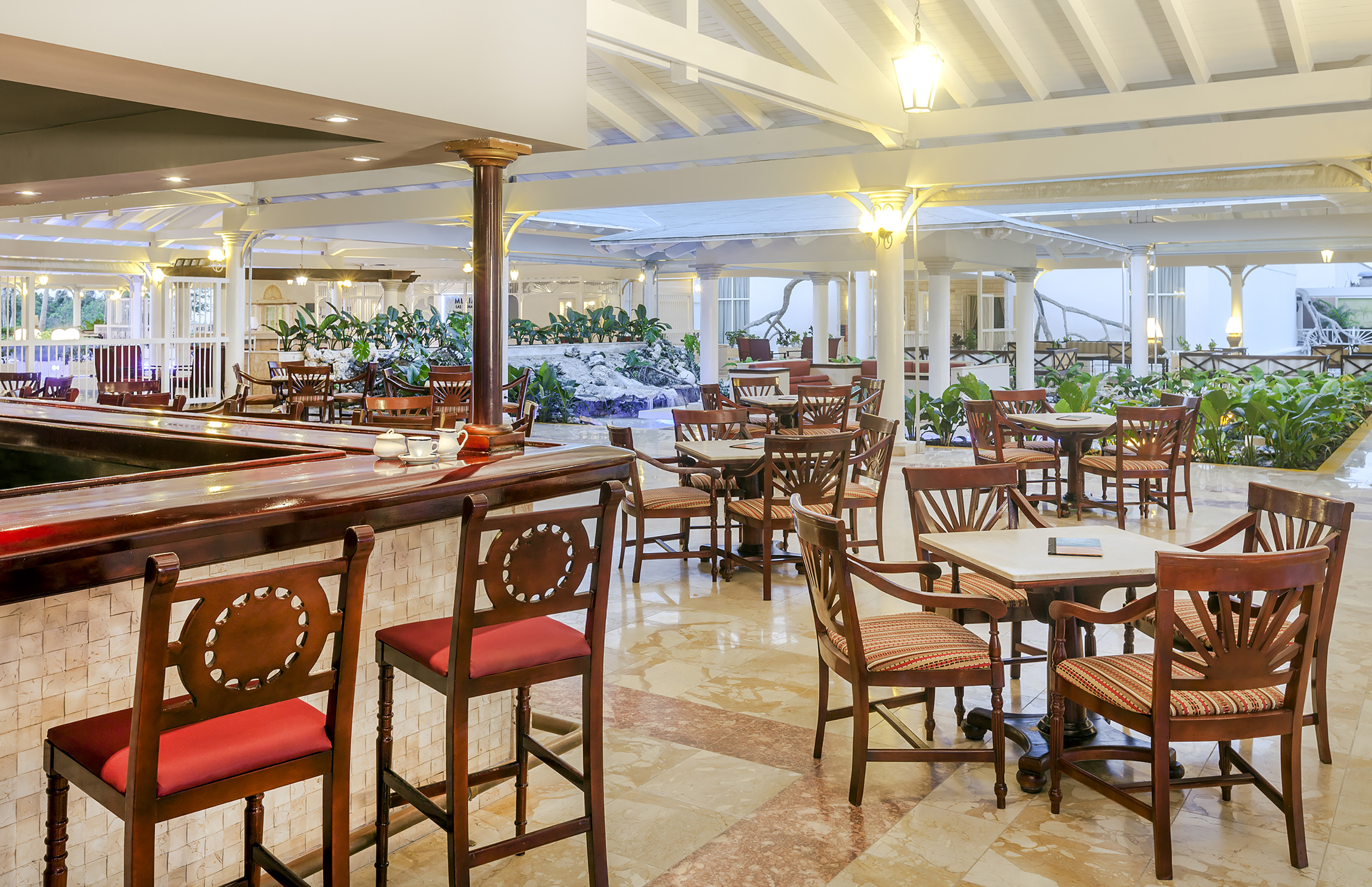 a room with tables and chairs